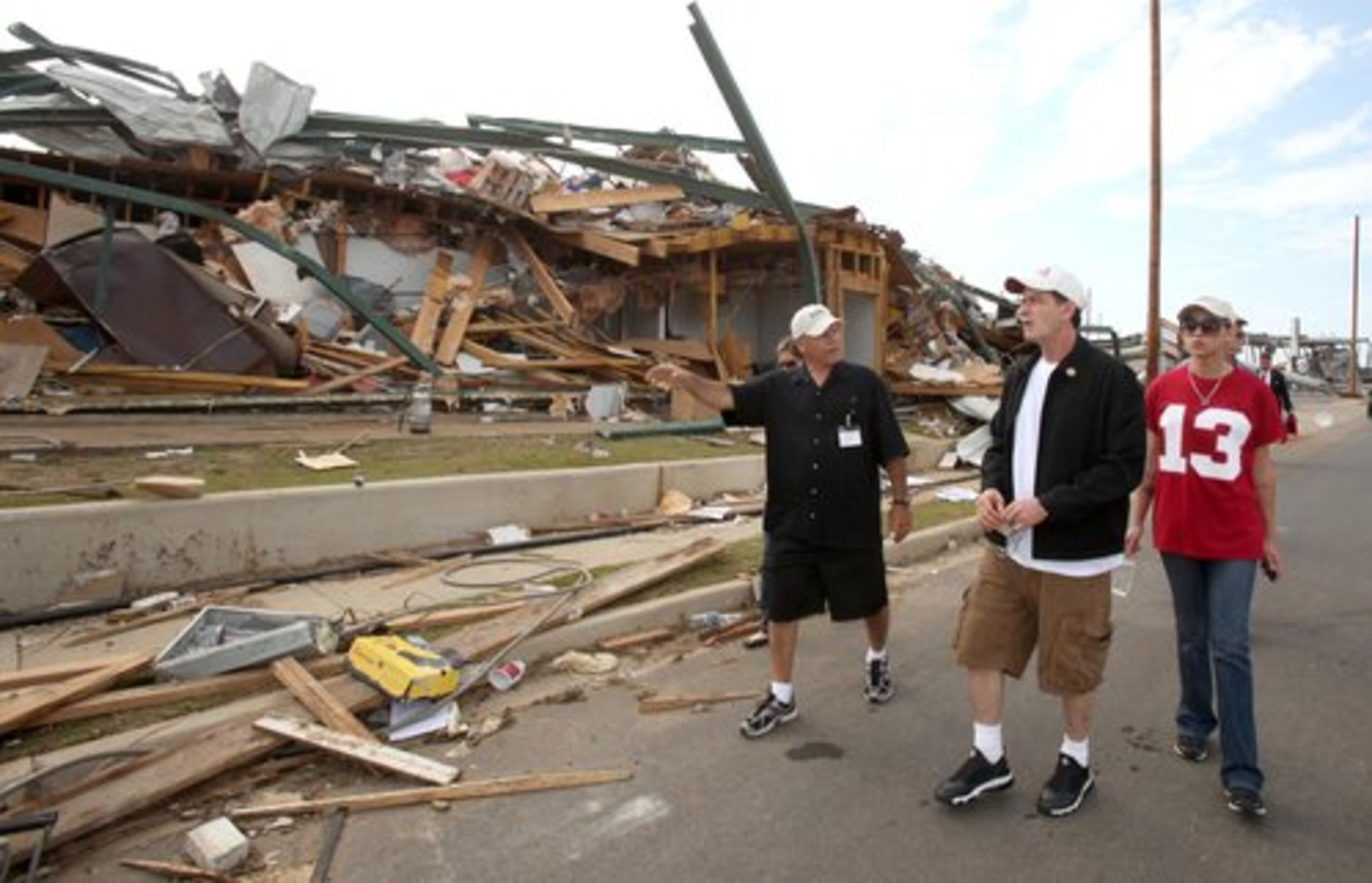 Sheen and one of his "goddesses," Natty Kenly, tour Tuscaloosa with Don Staley. Sheen spent much of Monday touring Tuscaloosa's storm devastated areas. He started in Alberta and made visits to 15th Street the University and the Belk Center.