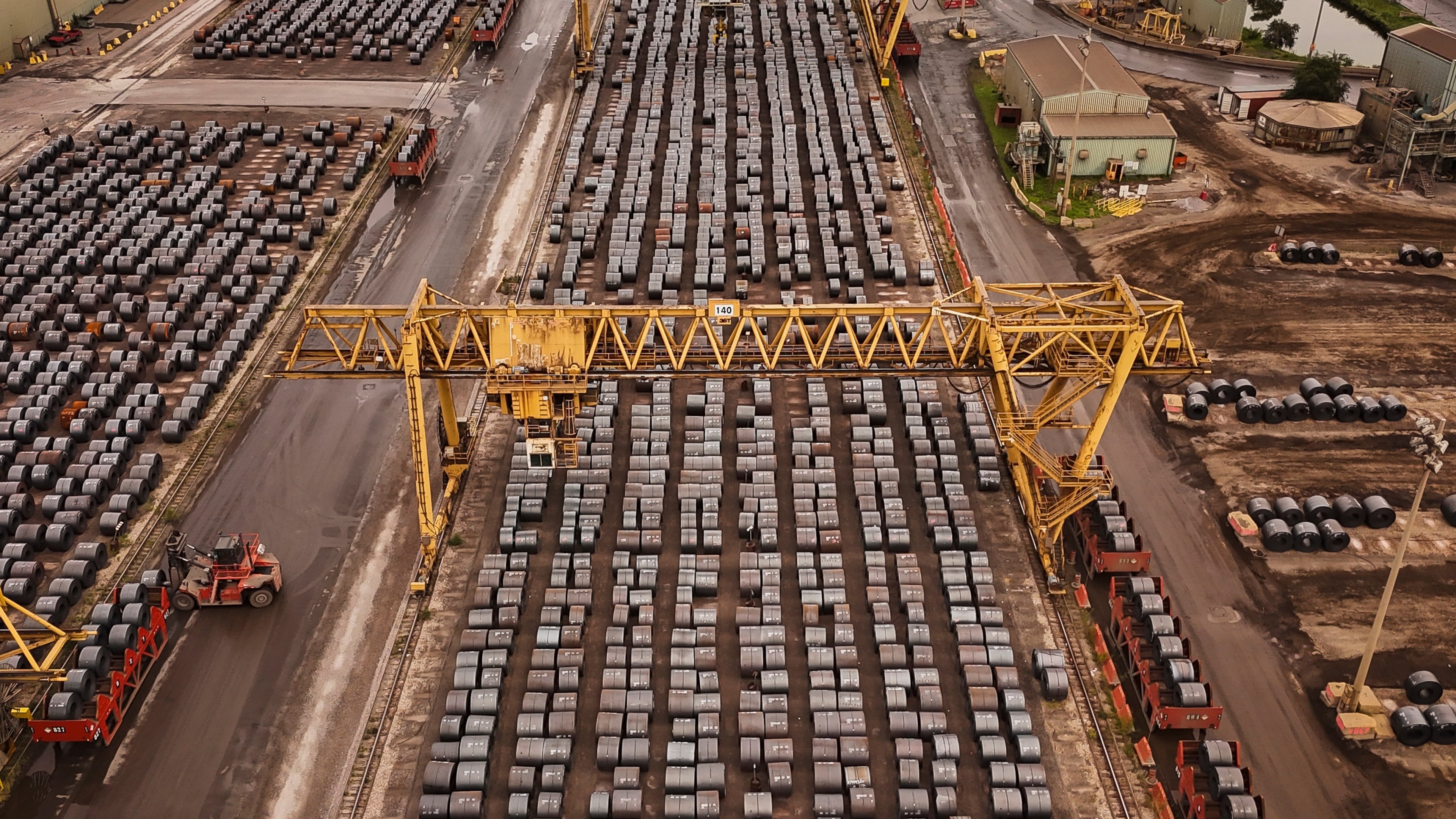 FILE - Rolled coils of steel sit in the yard at the ArcelorMittal Dofasco steel plant in Hamilton, Ont., Aug. 20, 2026. (Nick Iwanyshyn /The Canadian Press via AP, File)