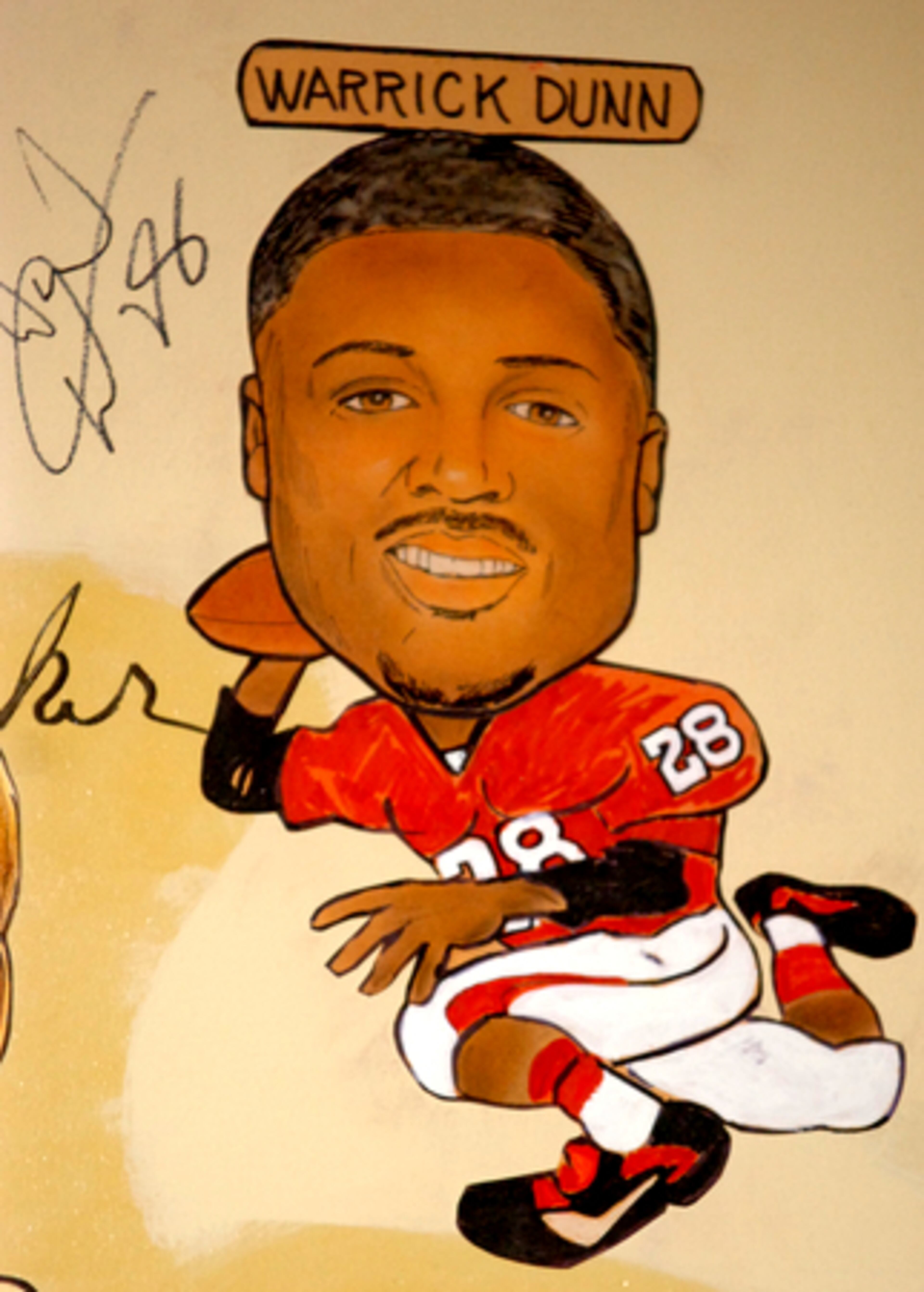 This caricature of Warrick Dunn was unveiled in the Palm Restaurant before the charity event kicked off.