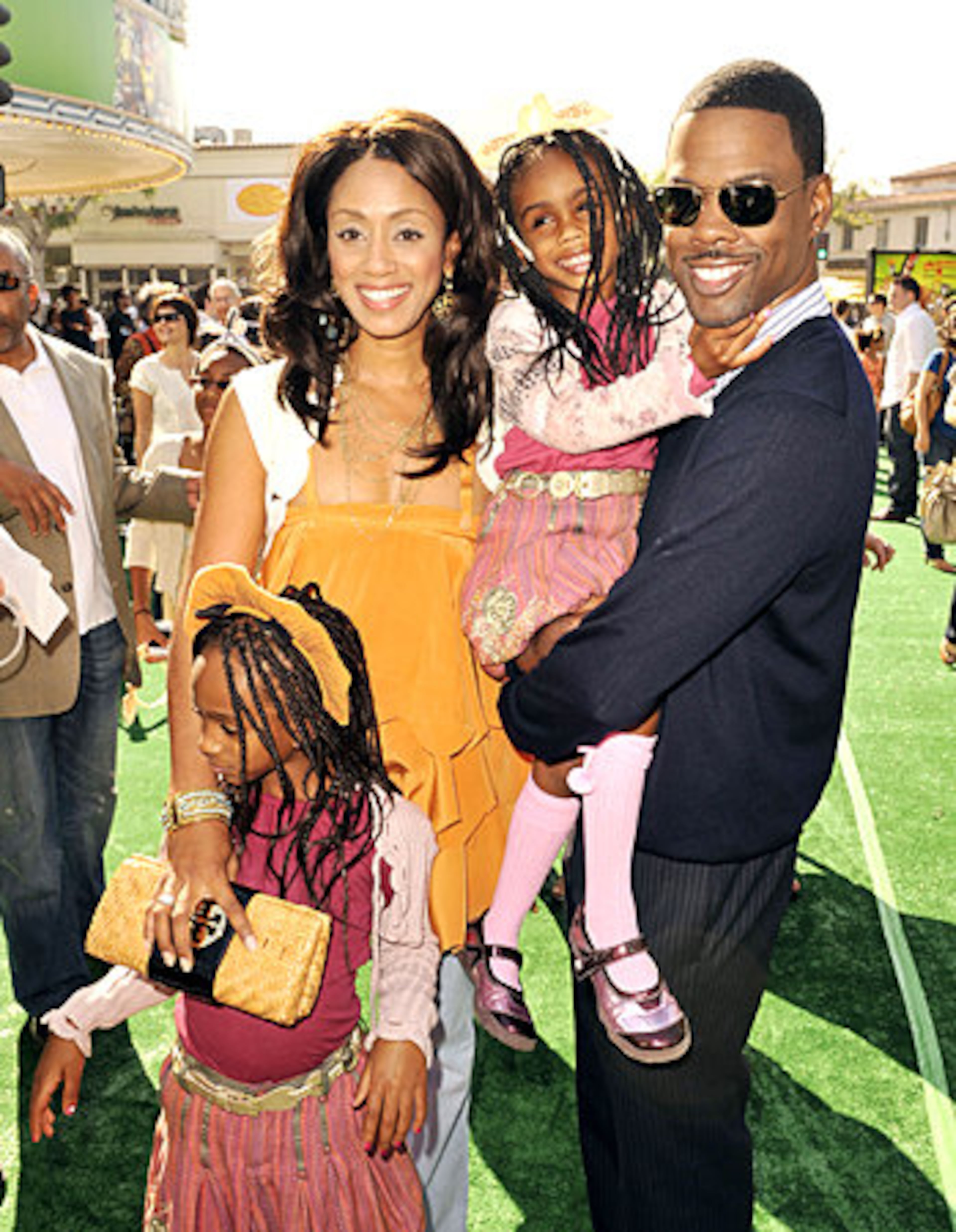 Actor Chris Rock (R), his wife Malaak Compton and their daughters Lola (L) and Zahra.