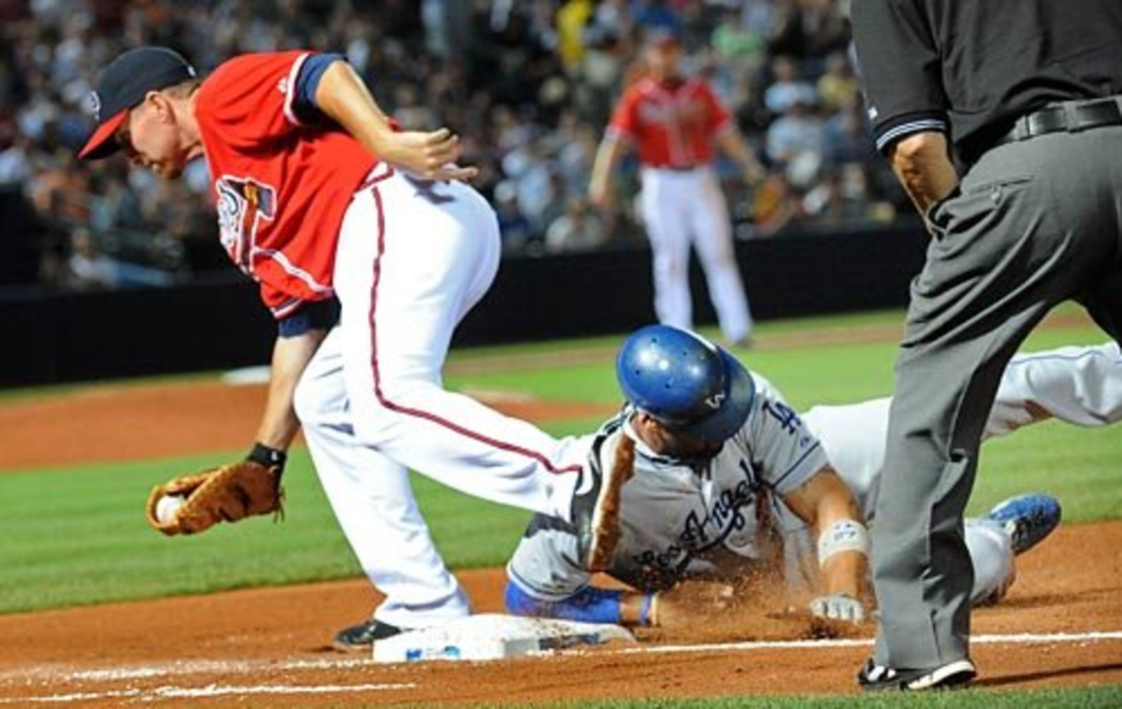 At the July 31 deadline, Atlanta Braves GM Frank Wren traded with Boston to get former Braves first baseman Adam LaRoche (left) back. Over 57 games in Atlanta, LaRoche hit .325 with 12 HRs and 40 RBI.