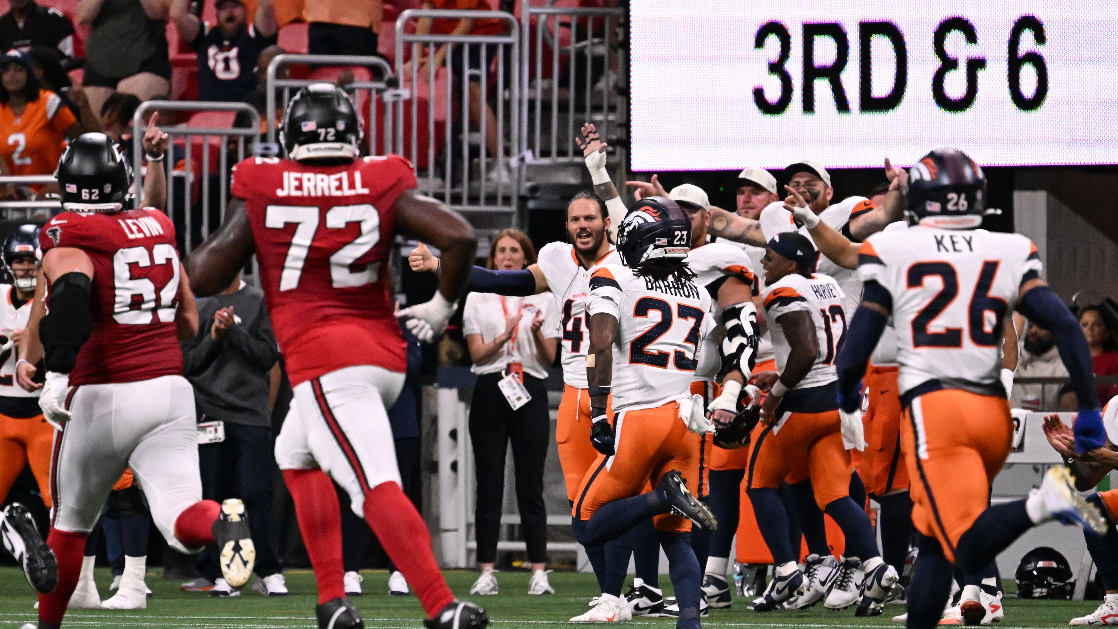 Denver Broncos cornerback Jahdae Barron runs for a touchdown after intercepting the ball during the first half of an NFL preseason game at Mercedes-Benz Stadium on Friday, Aug. 14, 2026, in Atlanta. (Hyosub Shin/AJC)