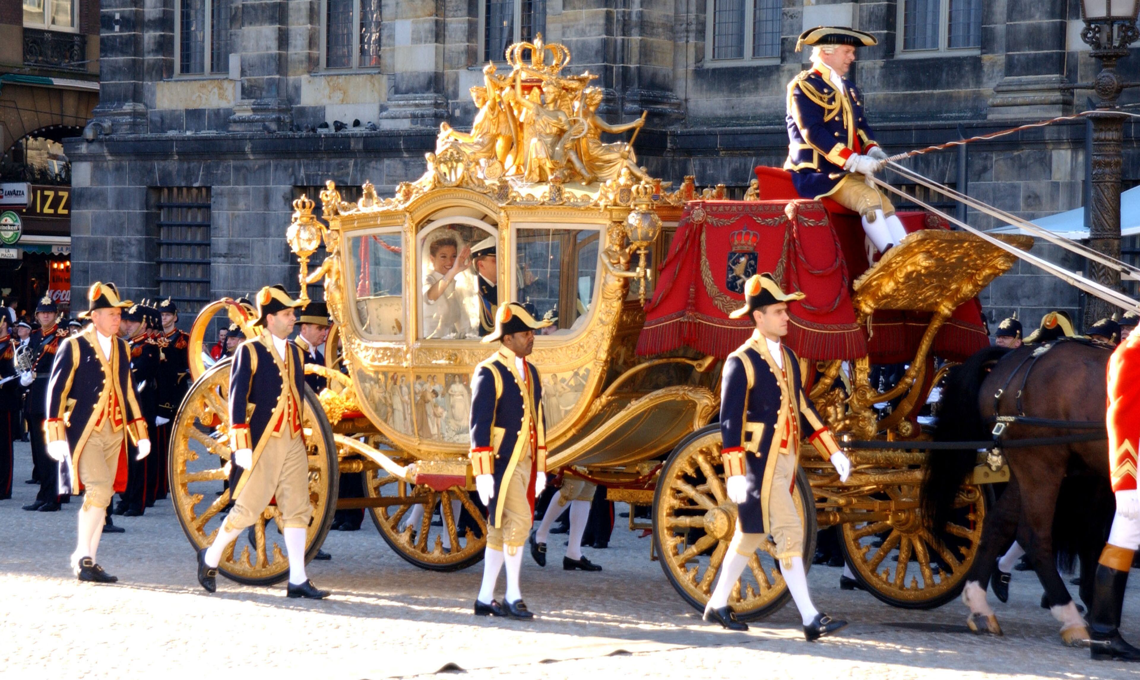 Dutch Crown Prince Willem Alexander and his new bride Crown Princess Maxima Zorreguieta arrive February 2, 2002 at the Royal Palace in Amsterdam, Holland after their wedding. (Photo by Anthony Harvey/Getty Images)