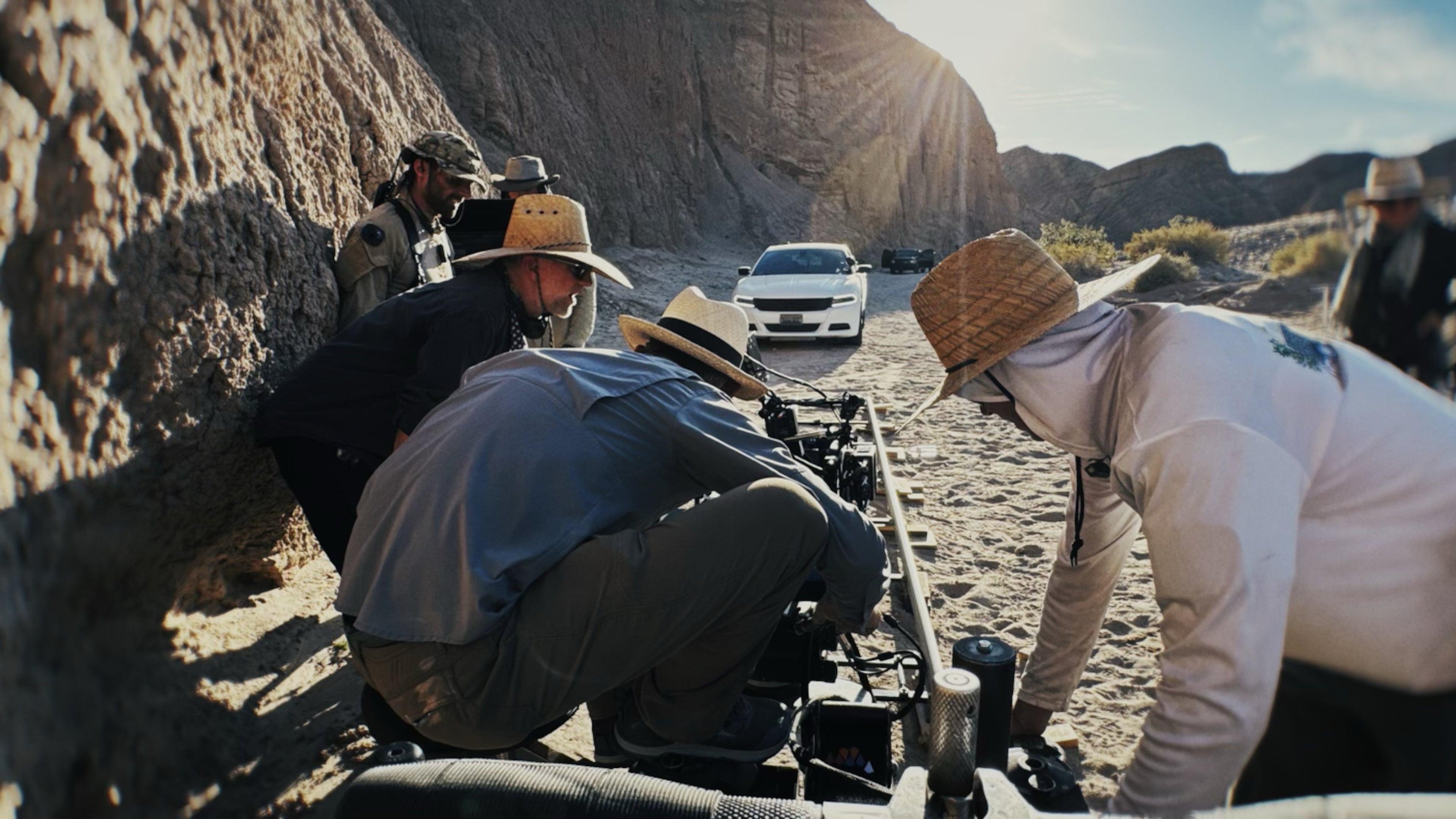 This image released by Warner Bros. Pictures shows camera/steadicam operator Colin Anderson filming a scene from "One Battle After Another." (Michael Bauman/Warner Bros. Pictures via AP)