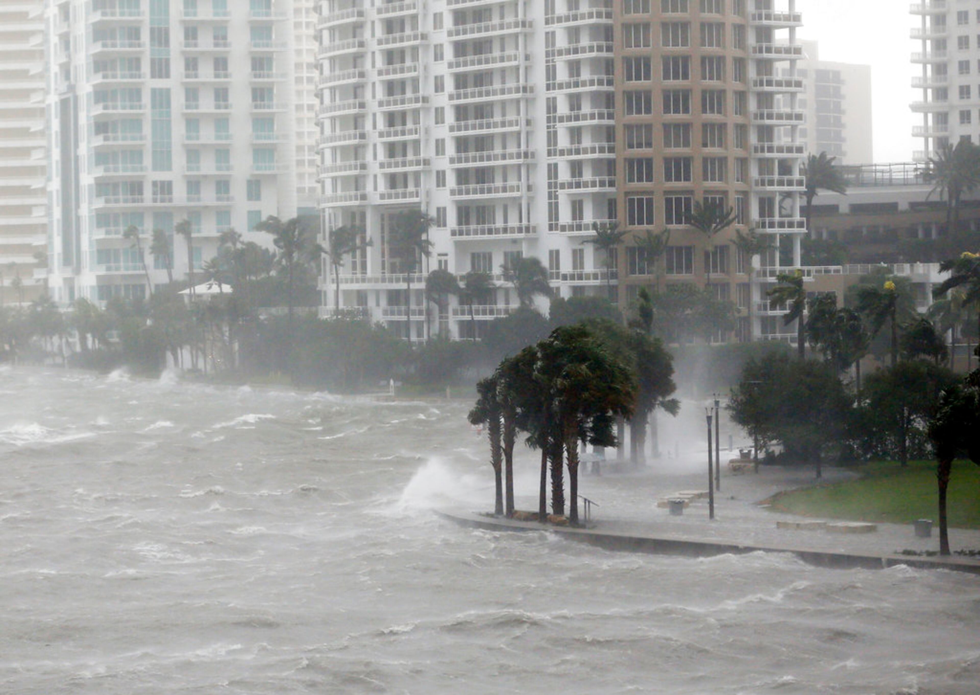Waves crash over a seawall at the mouth of the Miami River from Biscayne Bay, Fla., as Hurricane Irma passes by, Sunday, Sept. 10, 2017, in Miami. (AP Photo/Wilfredo Lee)