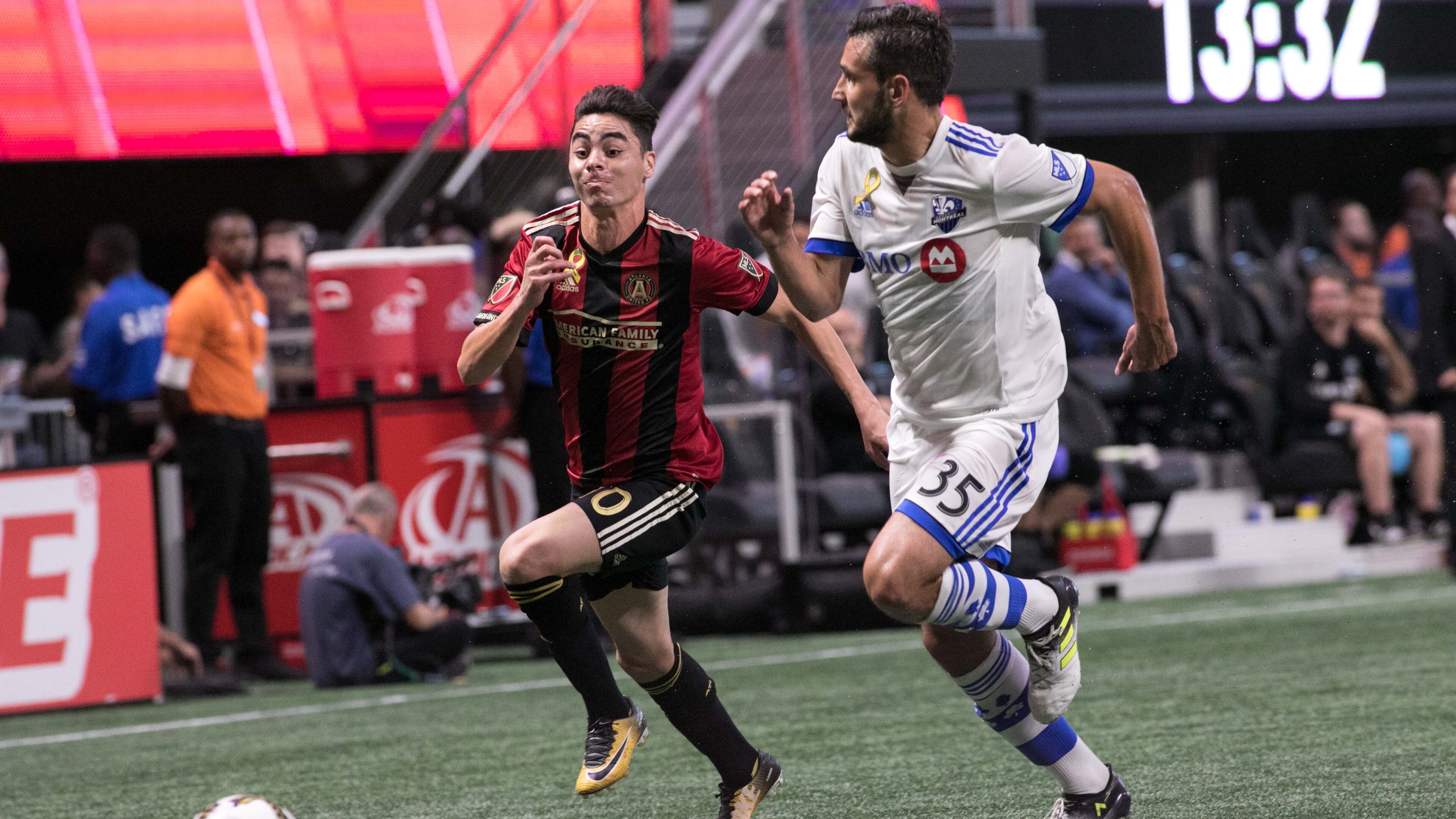 Atlanta United midfielder Miguel Almiron (10) pushes the ball past Montreal Impact defender Deian Boldor (35) during the first half of a MLS soccer game at Mercedes-Benz Stadium, Sunday, Sept. 24, 2017, in Atlanta. BRANDEN CAMP/SPECIAL