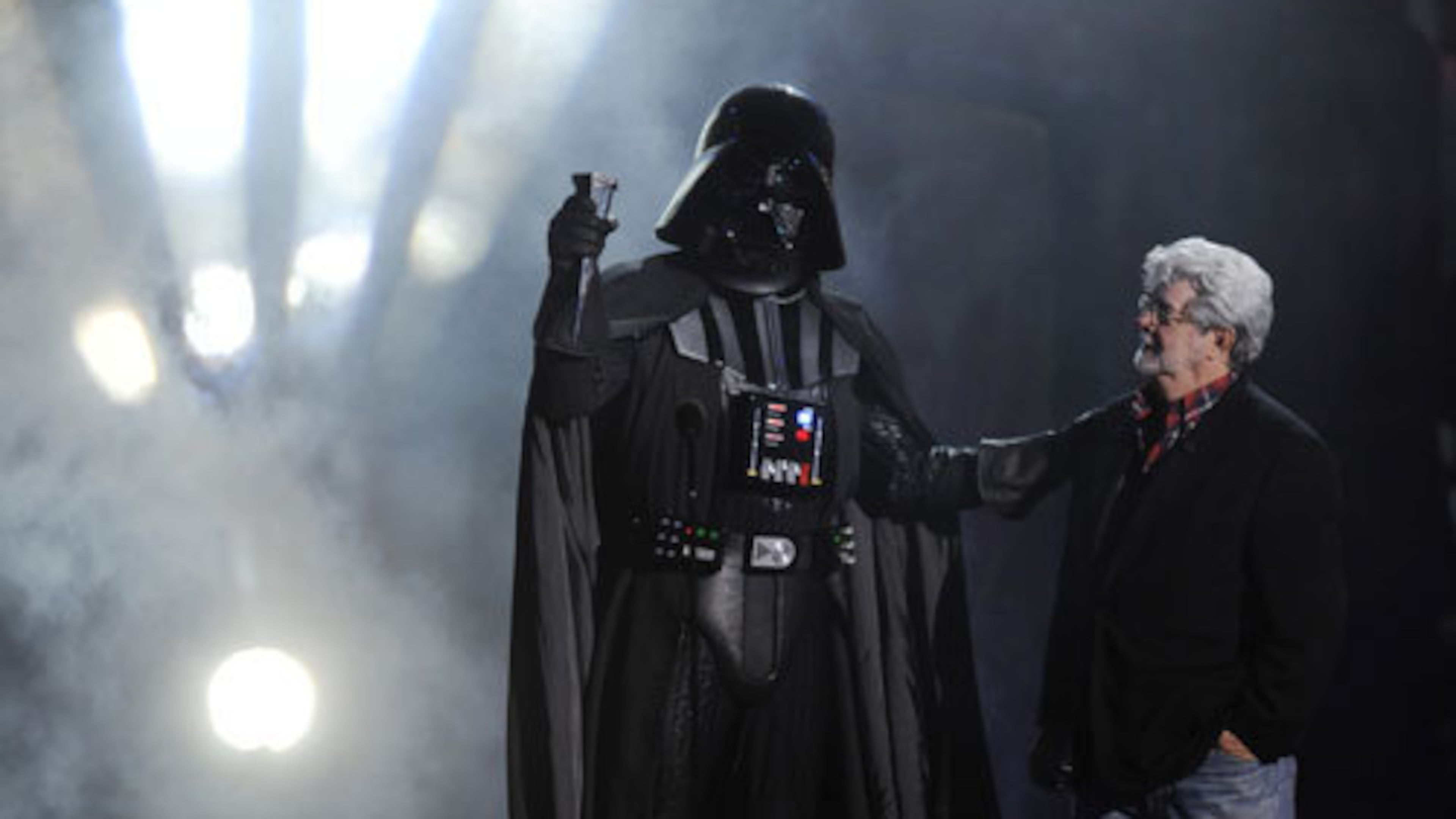 "Darth Vader" accepts the Ultimate Villain award from "Star Wars" creator George Lucas.