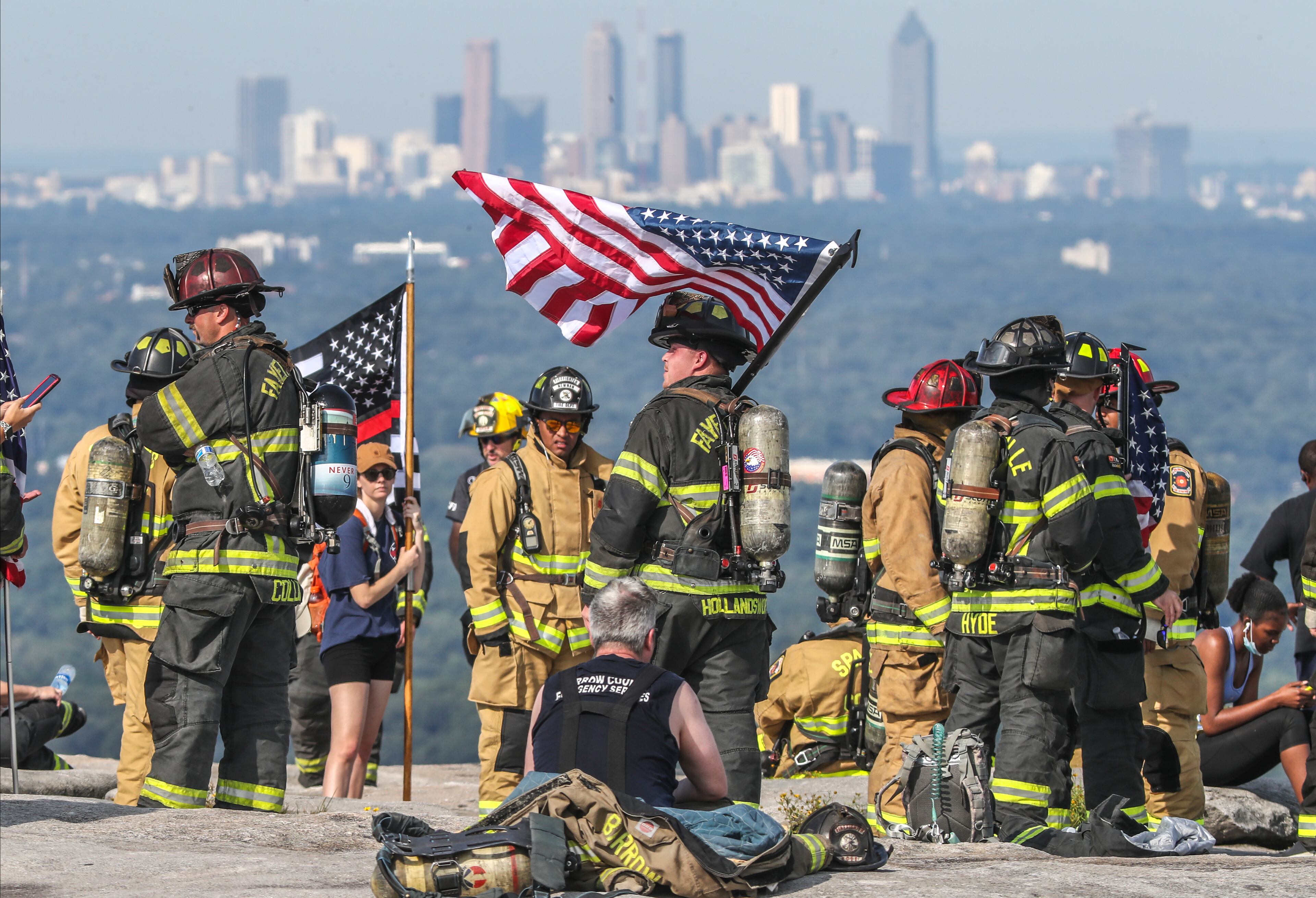 September 10, 2021 Stone Mountain: Wearing a full turnout firefighting gear, some 200 metro Atlanta area firefighters honored the 343 firefighters and paramedics, and 72 law enforcement officers who lost their lives on Sept. 11, 2001 by ascending Stone Mountain on Friday, September 10, 2021. The City of Fayetteville Fire Department who sponsors the annual event for the one-mile climb that is equivalent to 160 flights of stairs has seen the event grow every year that also includes police and military participants. Numerous events are scheduled Saturday around the metro area to observe the 20th anniversary of the terror attacks on Sept. 11, 2001. (John Spink / John.Spink@ajc.com)