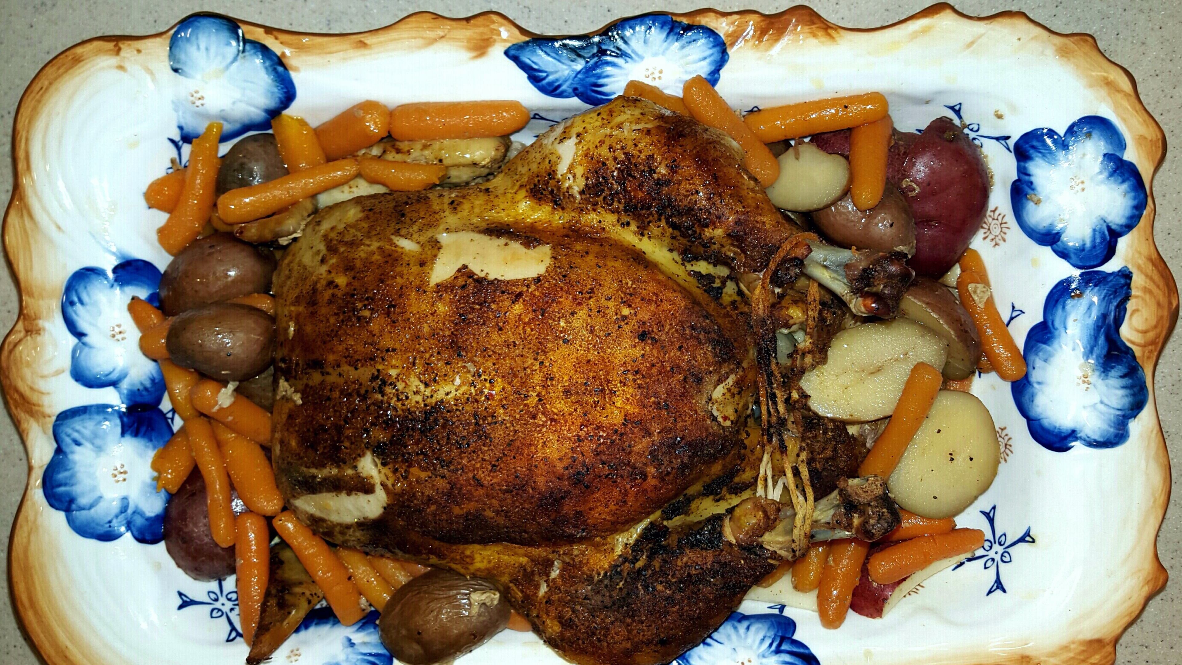 Oven roasted chicken with carrots and new potatoes. / Photo credits: Rhonda Dehbozorgi