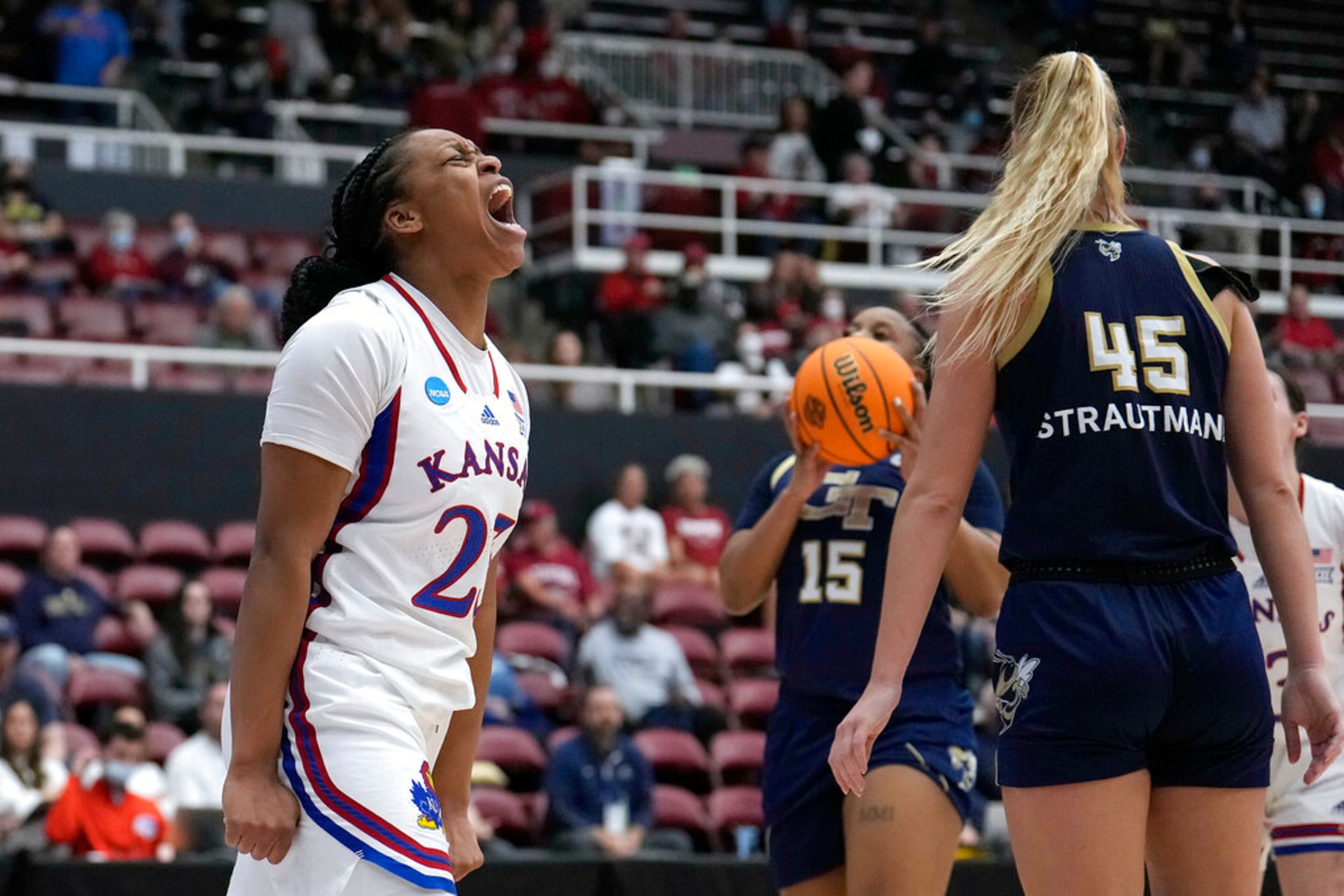 Kansas guard Chandler Prater (25) reacts after scoring against Georgia Tech during the second half of a first-round game in the NCAA women's college basketball tournament Friday, March 18, 2022, in Stanford, Calif. (AP Photo/Tony Avelar)