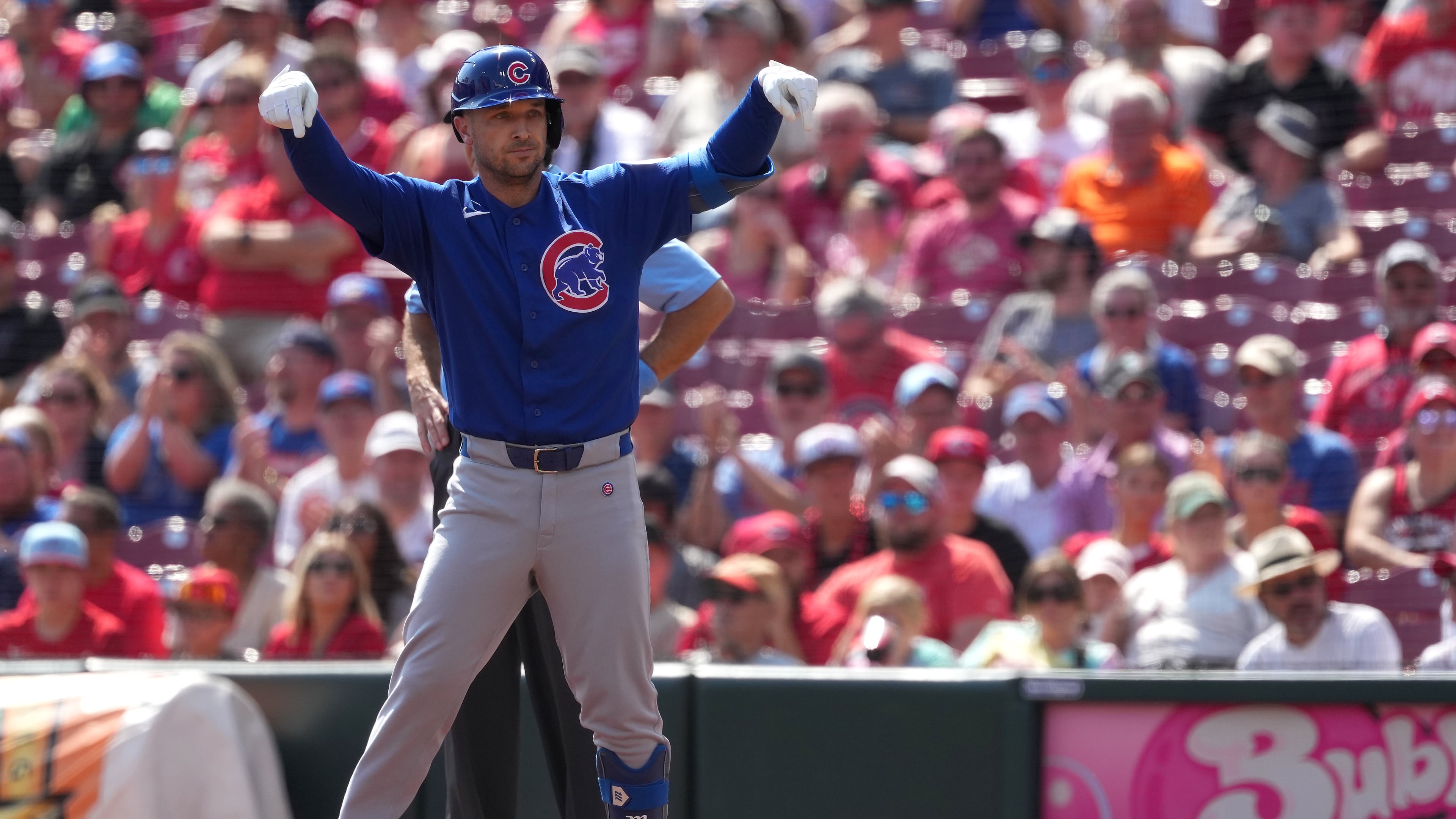 Chicago Cubs' Alex Bregman celebrates after a one-run single during the first inning of a baseball game against the Cincinnati Reds, Sunday, Sept. 20, 2026, in Cincinnati. (AP Photo/Kareem Elgazzar)