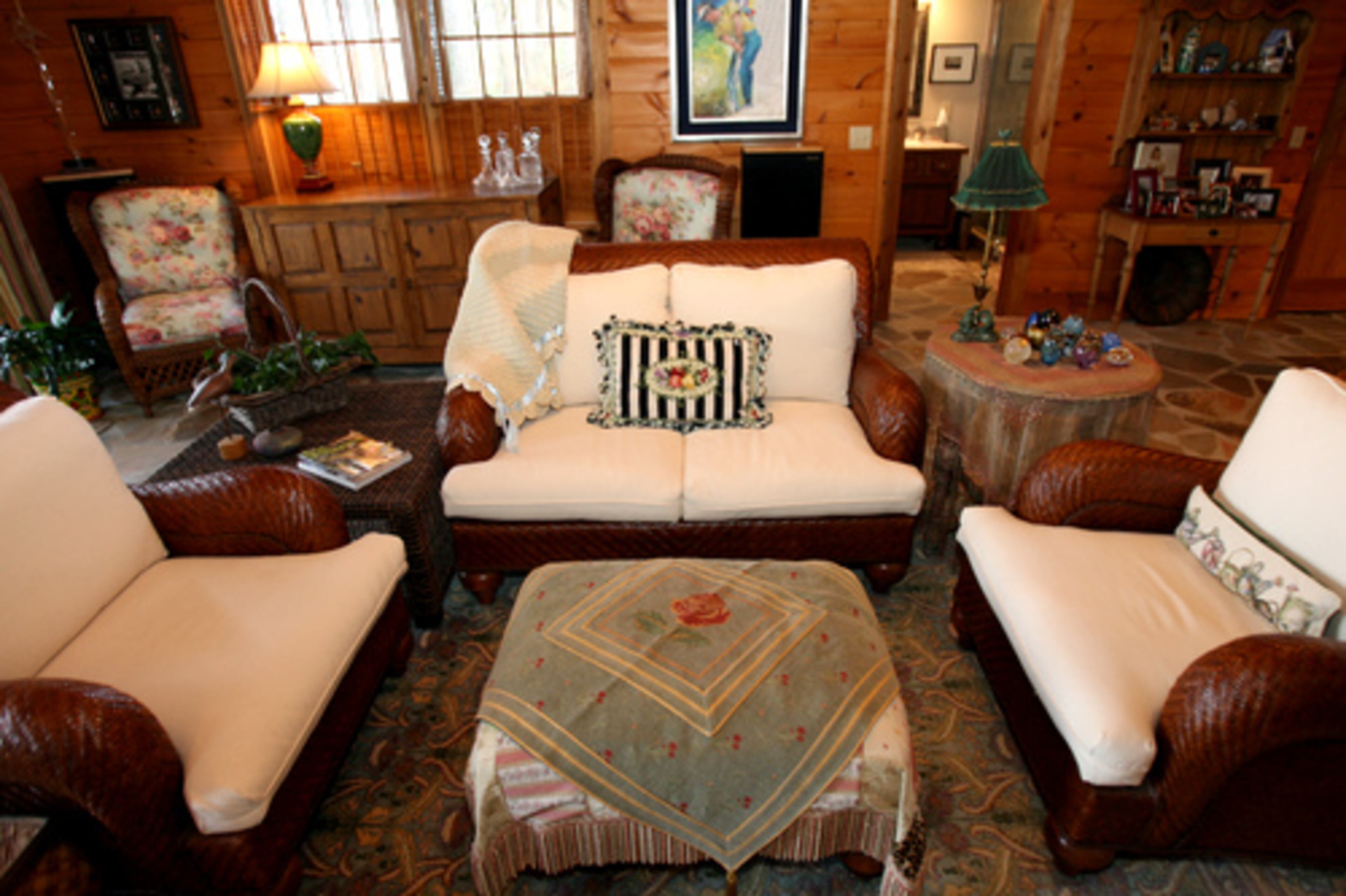 The terrace level contains a comfortable sitting area and a fireplace.