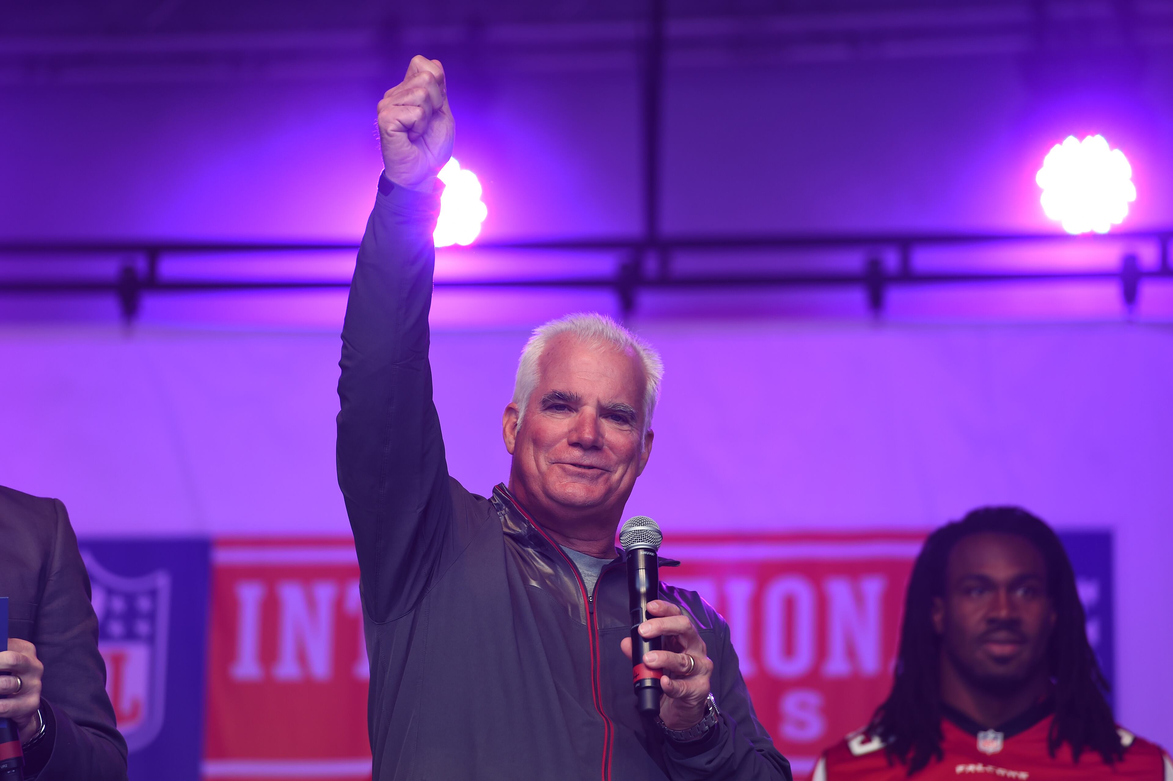 Atlanta Falcons head coach Mike Smith speaks on stage during the NFL Fan Rally in Trafalgar Square, London, England, Saturday, Oct. 25, 2014. The Atlanta Falcons will play the Detroit Lions in an NFL football game at London's Wembley Stadium on Sunday Oct. 26. (AP Photo/Tim Ireland)