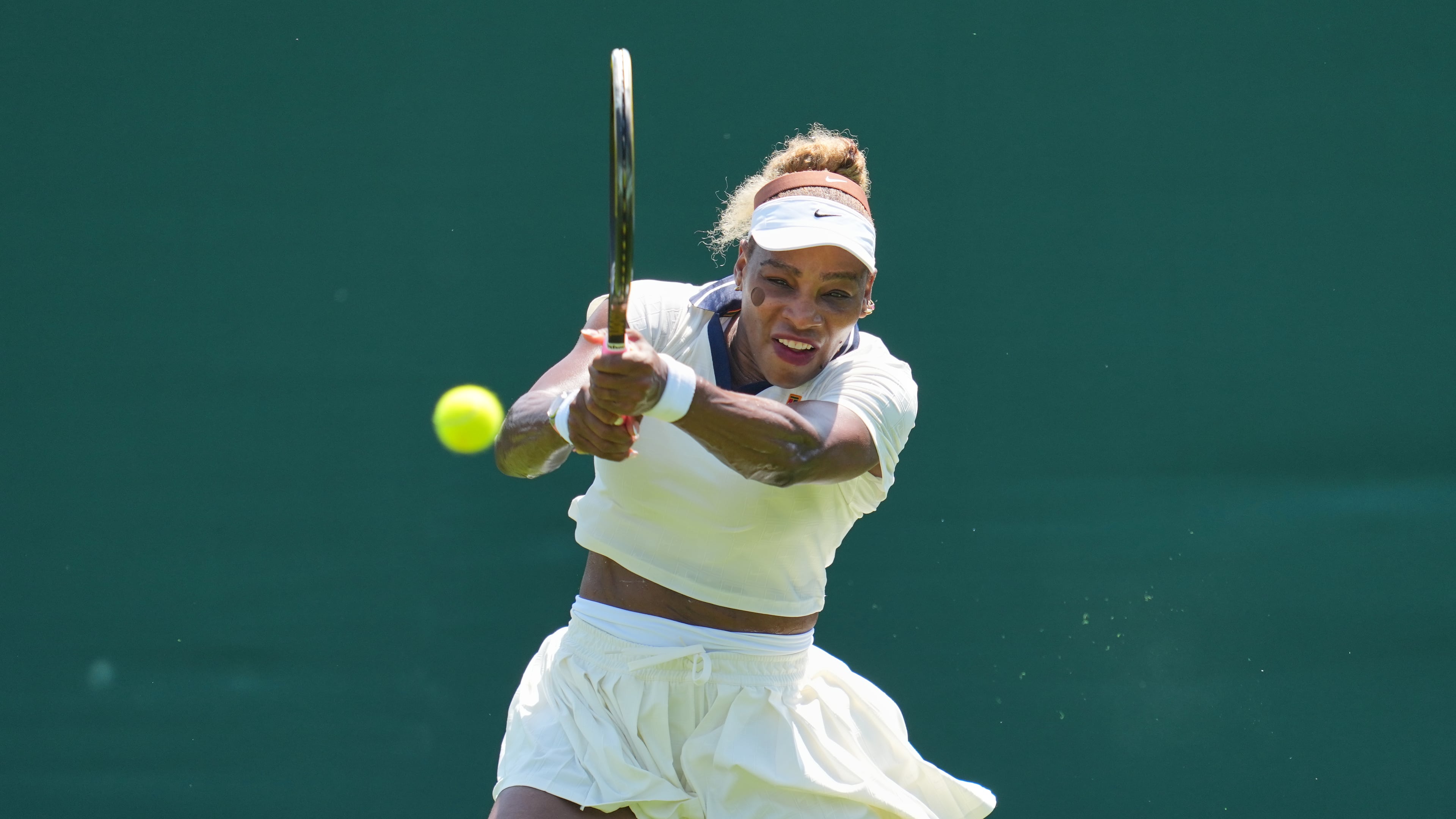 Serena Williams of the United States plays a return during a practice session ahead of the Wimbledon Tennis Championships, in London, Wednesday, June 24, 2026. (AP Photo/Kin Cheung)
