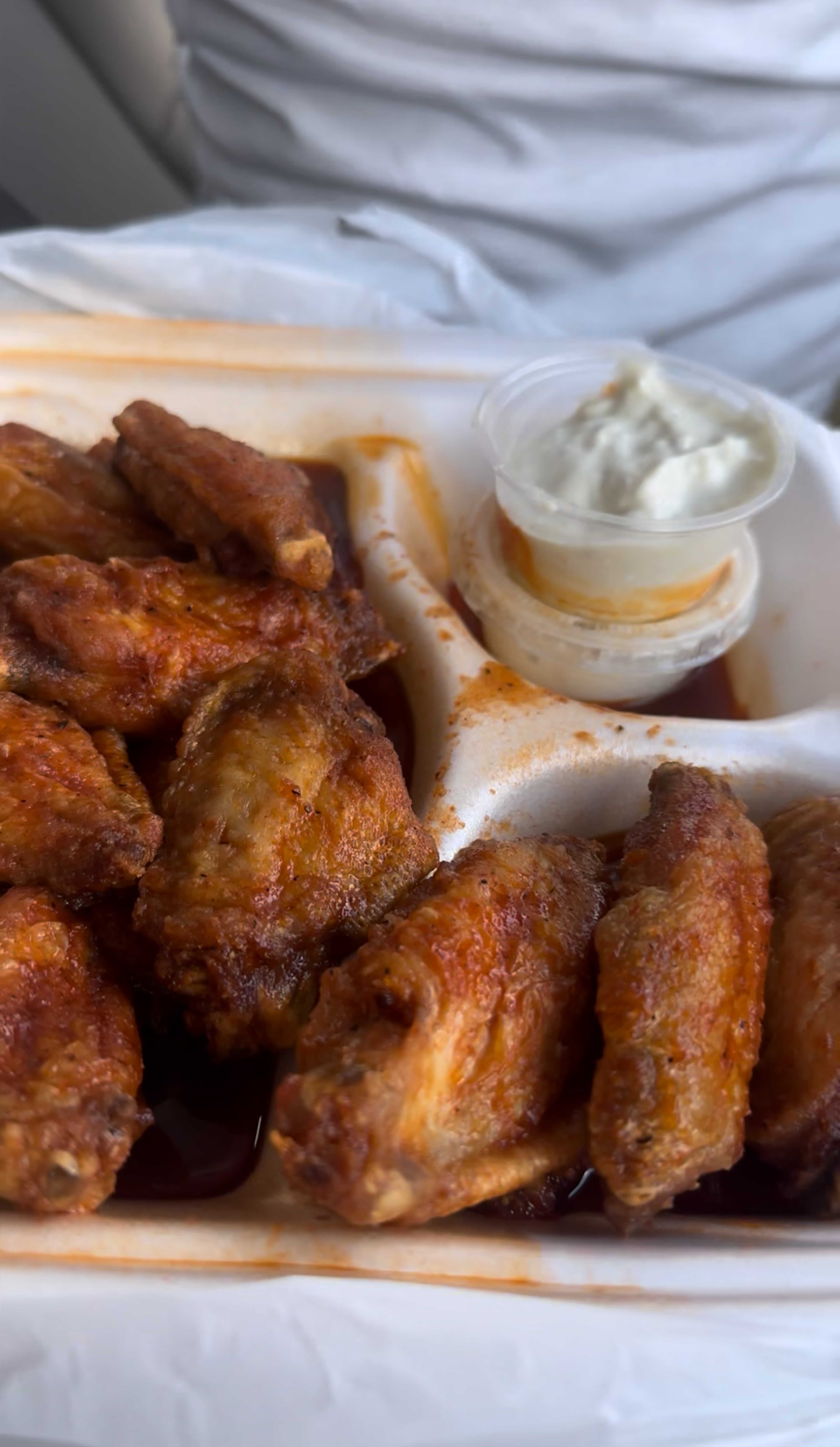Sweet heat wings with Fletcher's house-made blue cheese from Fletcher's Place. (Justin Brown for the AJC)