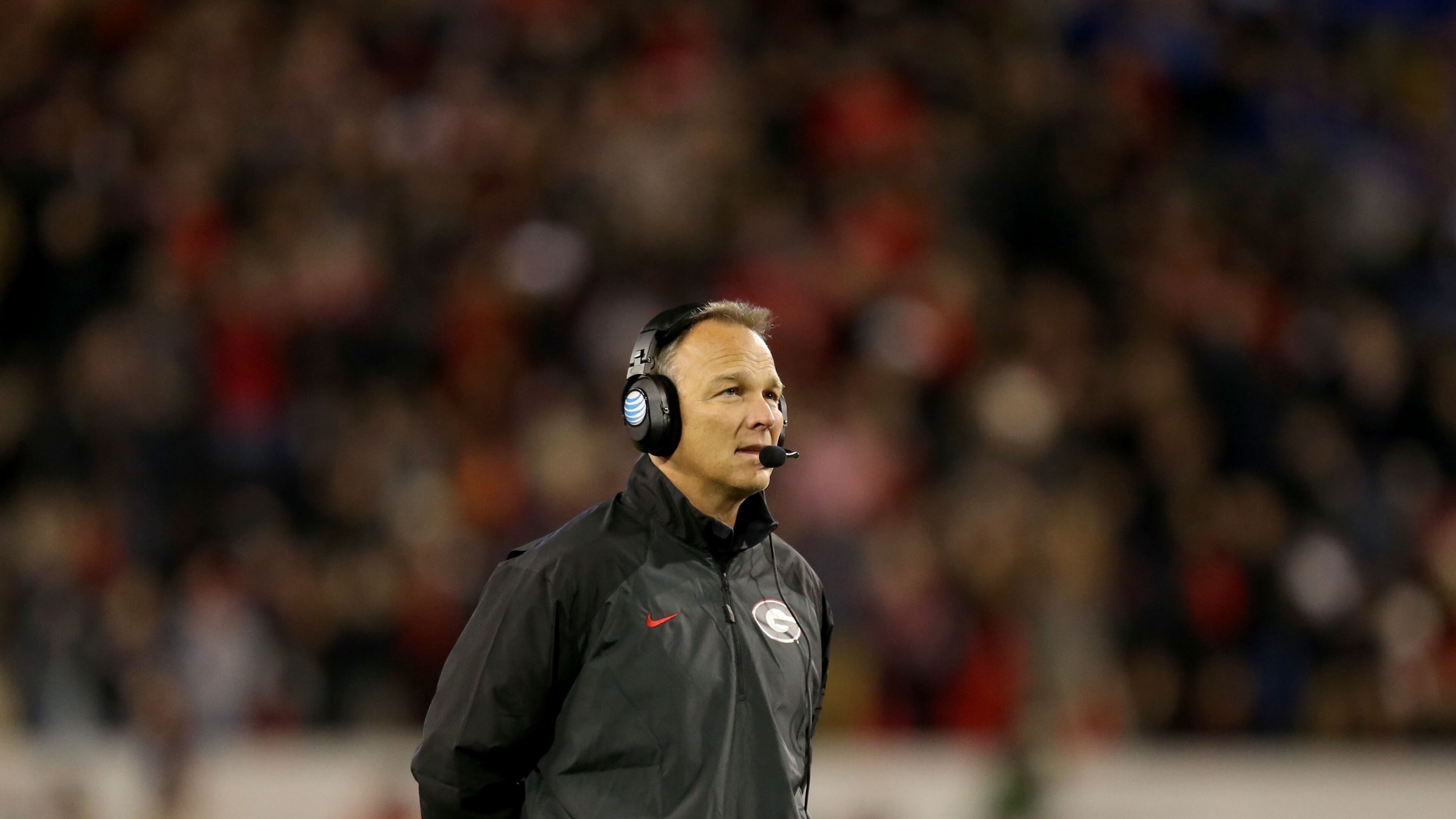 November 23, 2013 - Athens, Ga.: Georgia Bulldogs coach Mark Richt is shown on the sideline during their win over the Kentucky Wildcats at Sanford Stadium Saturday night in Athens, Ga., November 23, 2013. JASON GETZ / JGETZ@AJC.COM Mark Richt needs to at least suspend his four arrested players.