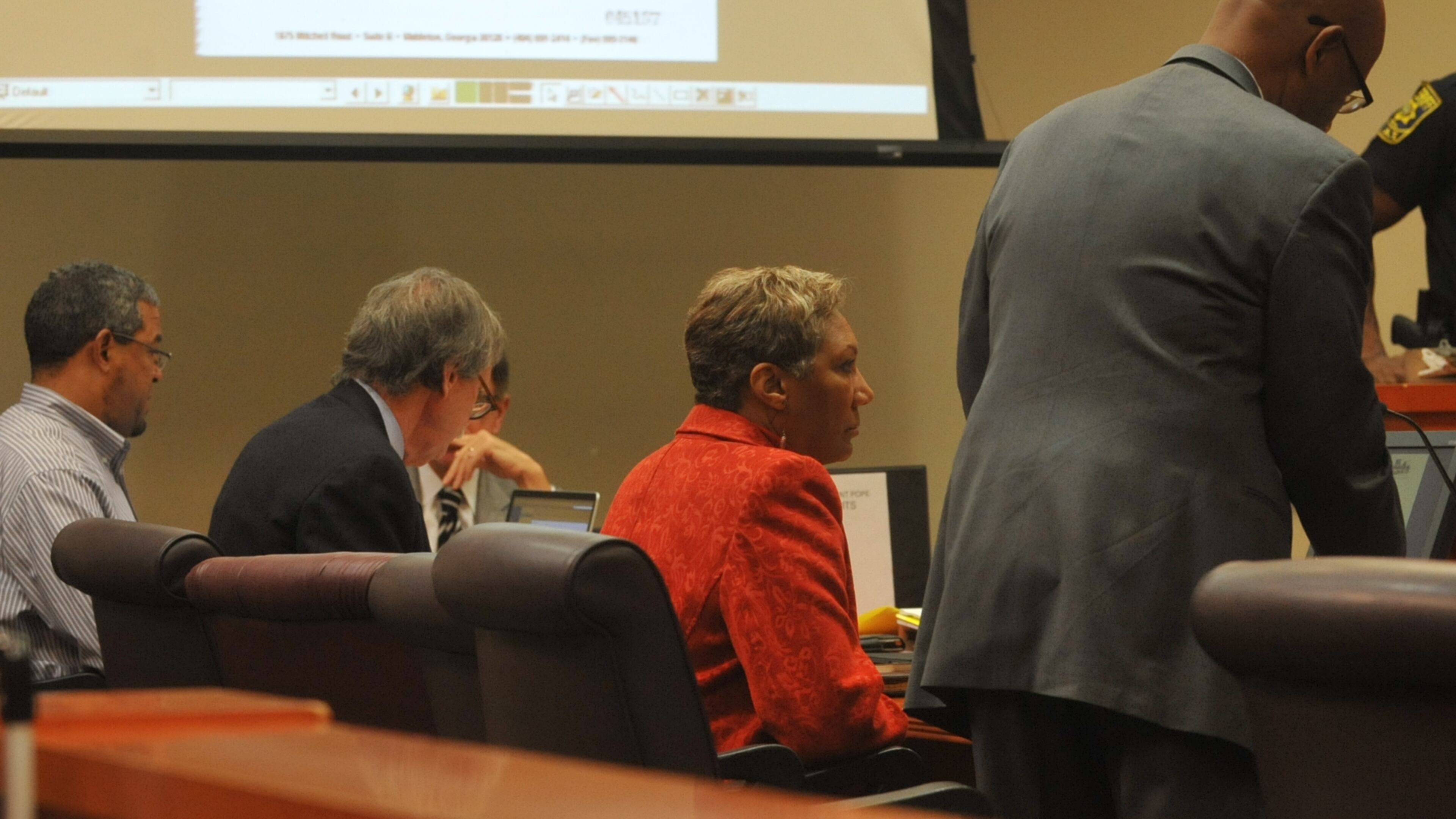 More than 3 1/2 years after Pat Reid and Tony Pope were first indicted, prosecutors began making their case to a jury Wednesday that the former husband and wife team had manipulated the DeKalb school district to pocket more than $1 million.