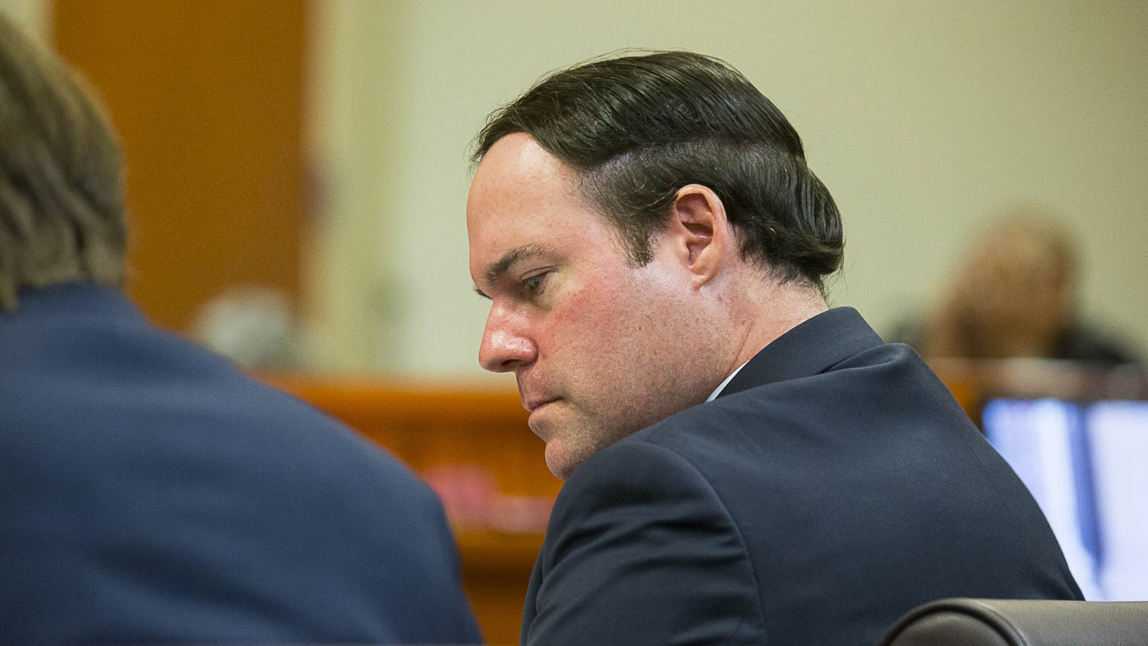 Georgia Department of Revenue attorney Alex Sponseller sits with his team in the courtroom of Judge Alan C. Harvey at the DeKalb County Courthouse in Decatur. (ALYSSA POINTER/ALYSSA.POINTER@AJC.COM) AJC FILE PHOTO