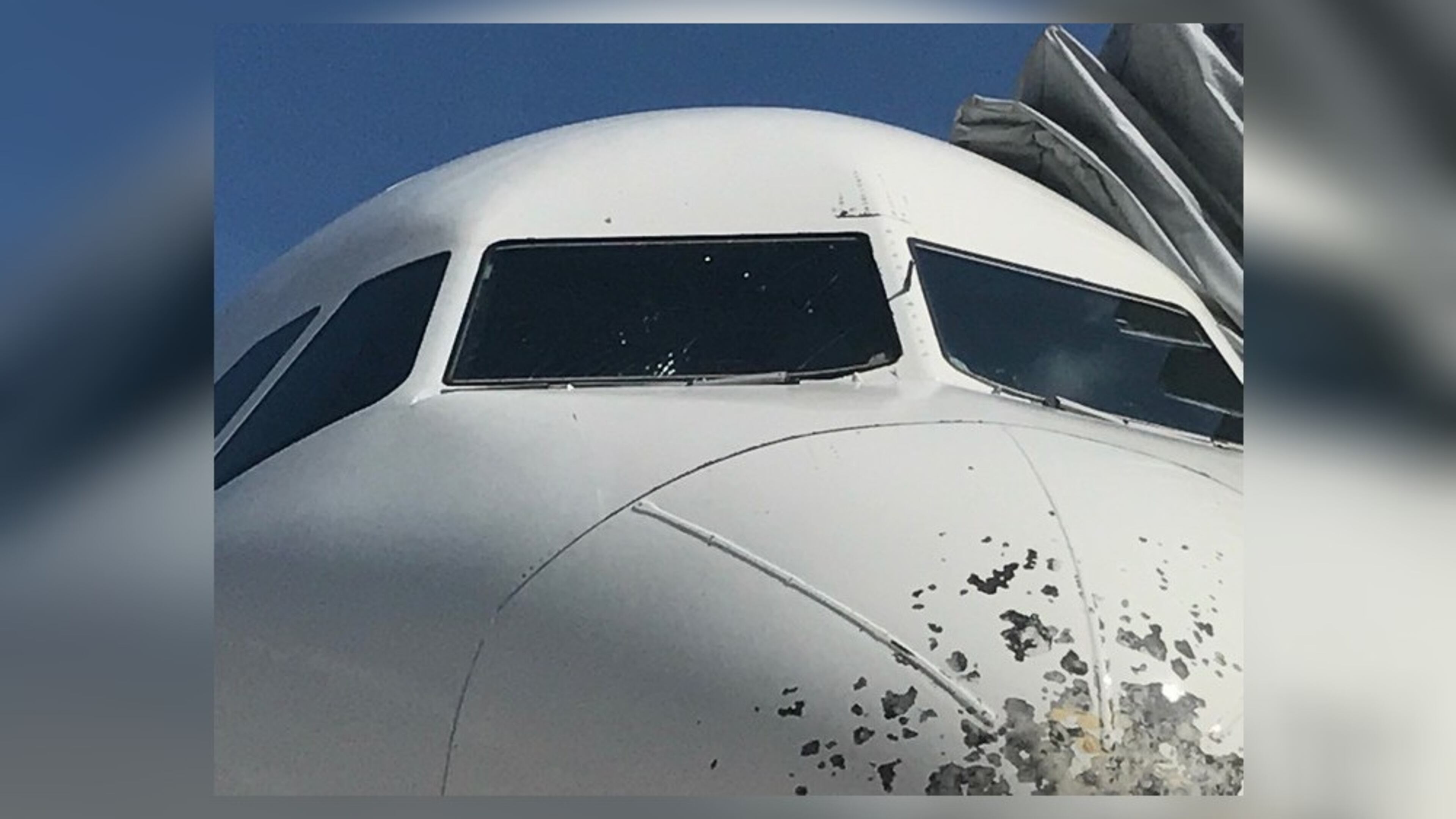A Delta flight from Atlanta to Haiti made an emergency landing in Florida after the windshield was struck by hail.