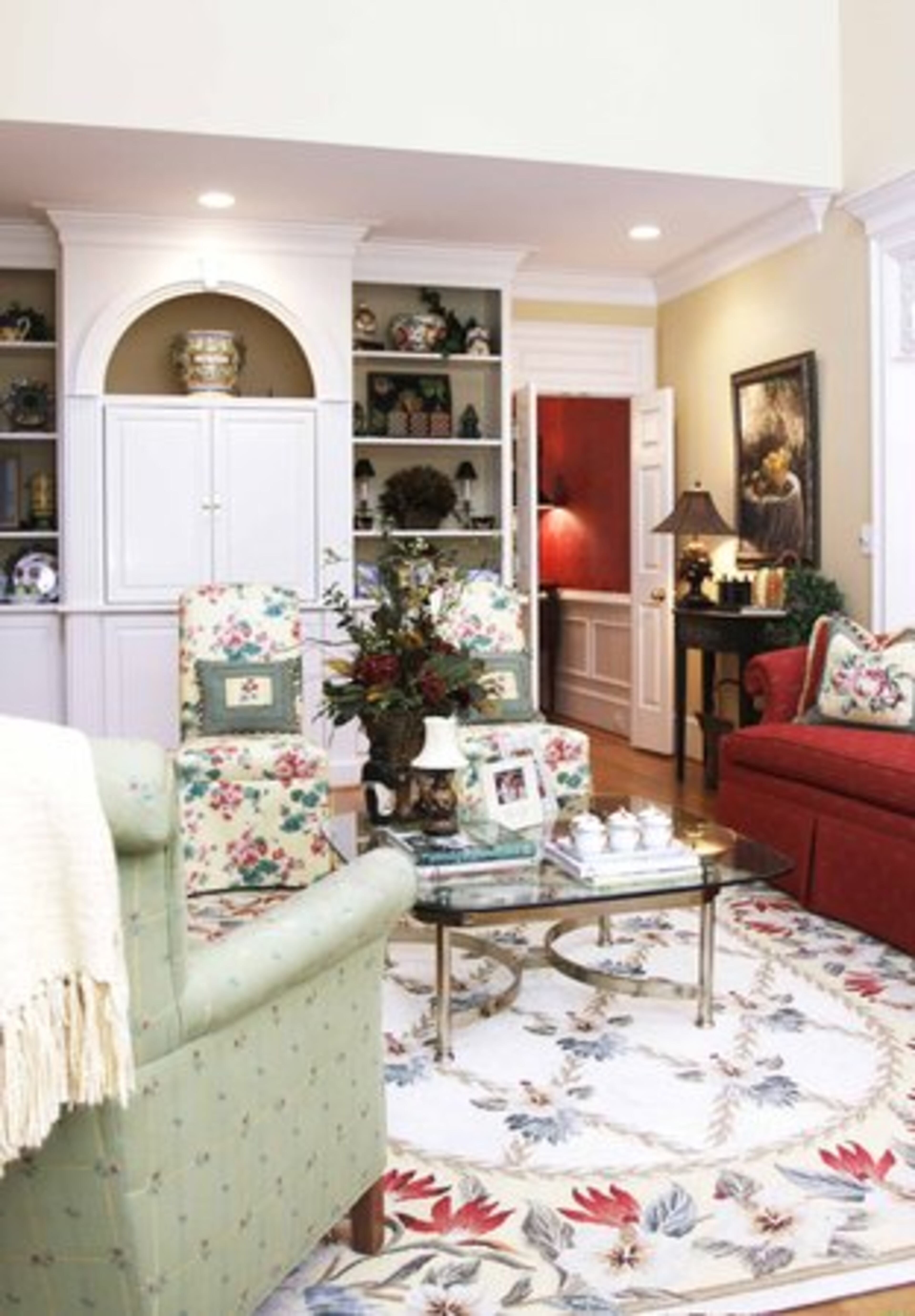 "We spend most of our time in this room," says Tim, "it's comfortable, we entertain in here, read the paper and watch the news." The den (pictured) opens to the kitchen.