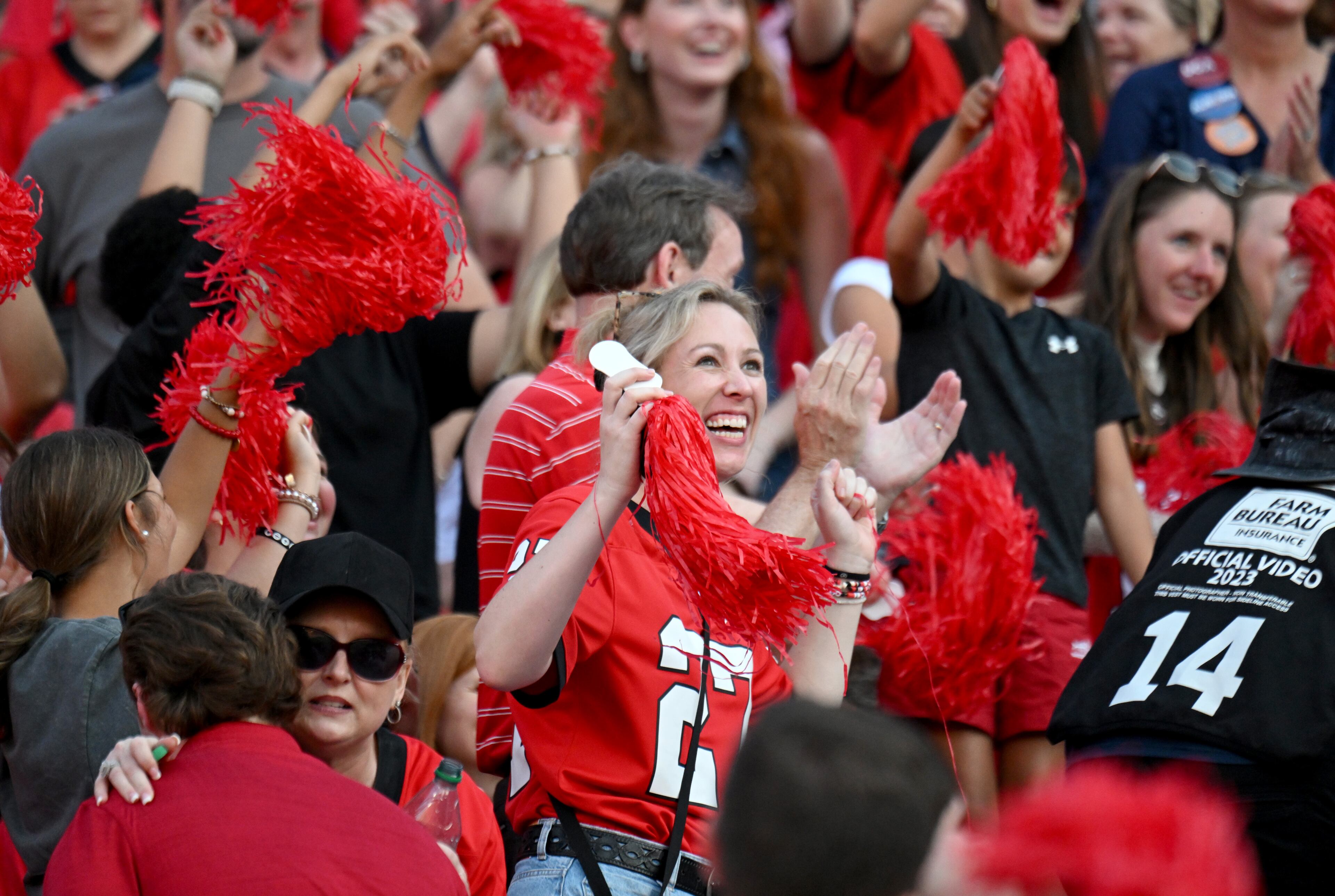 Georgia fans cheer during the second half in an NCAA football game at Sanford Stadium, Saturday, October 5, 2024, in Athens. Georgia won 31-13 over Auburn. (Hyosub Shin / AJC)