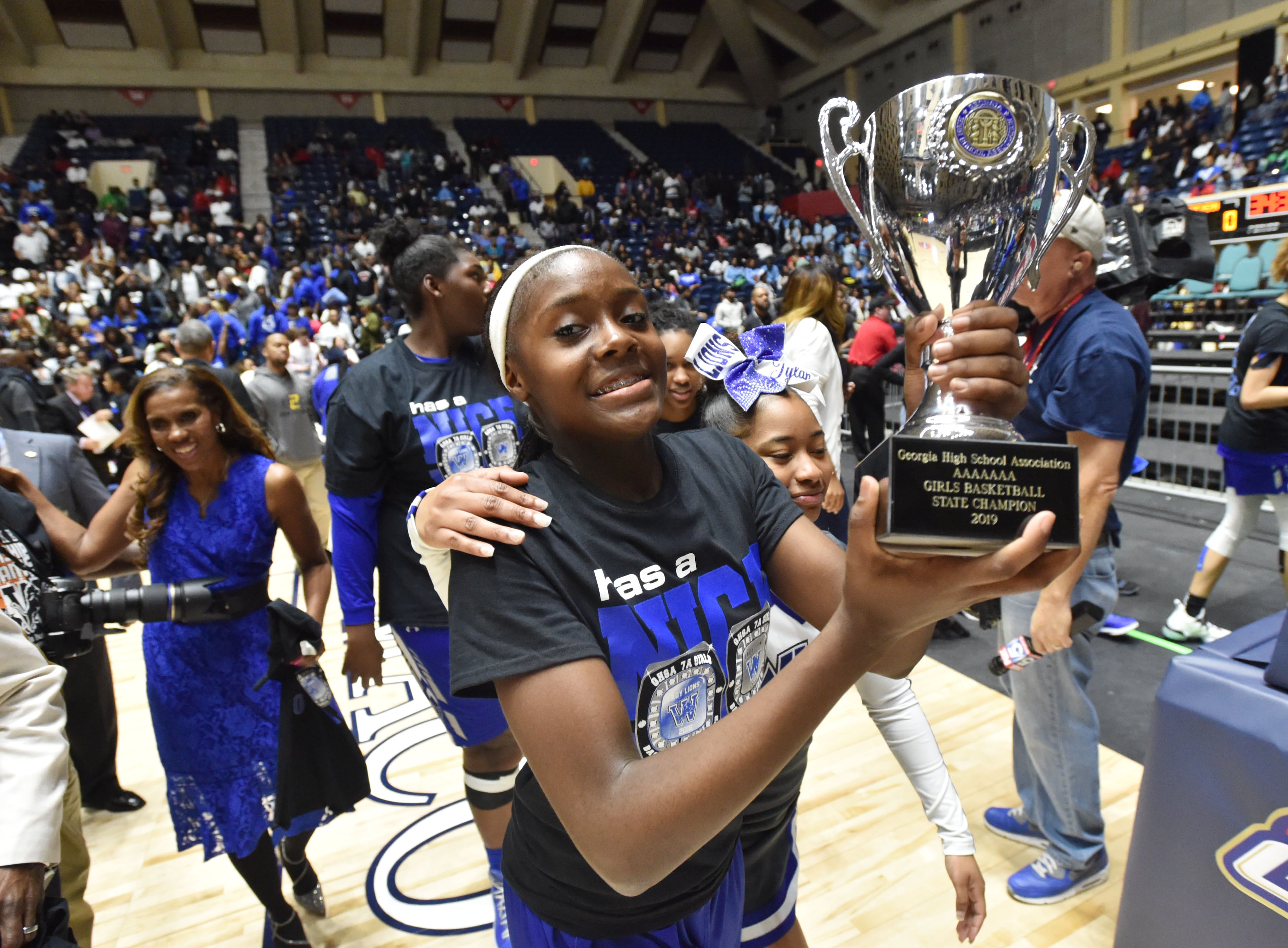 March 9, 2019 Macon - Westlake players celebrate their victory in GHSA State Basketball Championship game at the Macon Centreplex in Macon on Saturday, March 9, 2019. Westlake won 60-53 over the Collins Hill. HYOSUB SHIN / HSHIN@AJC.COM