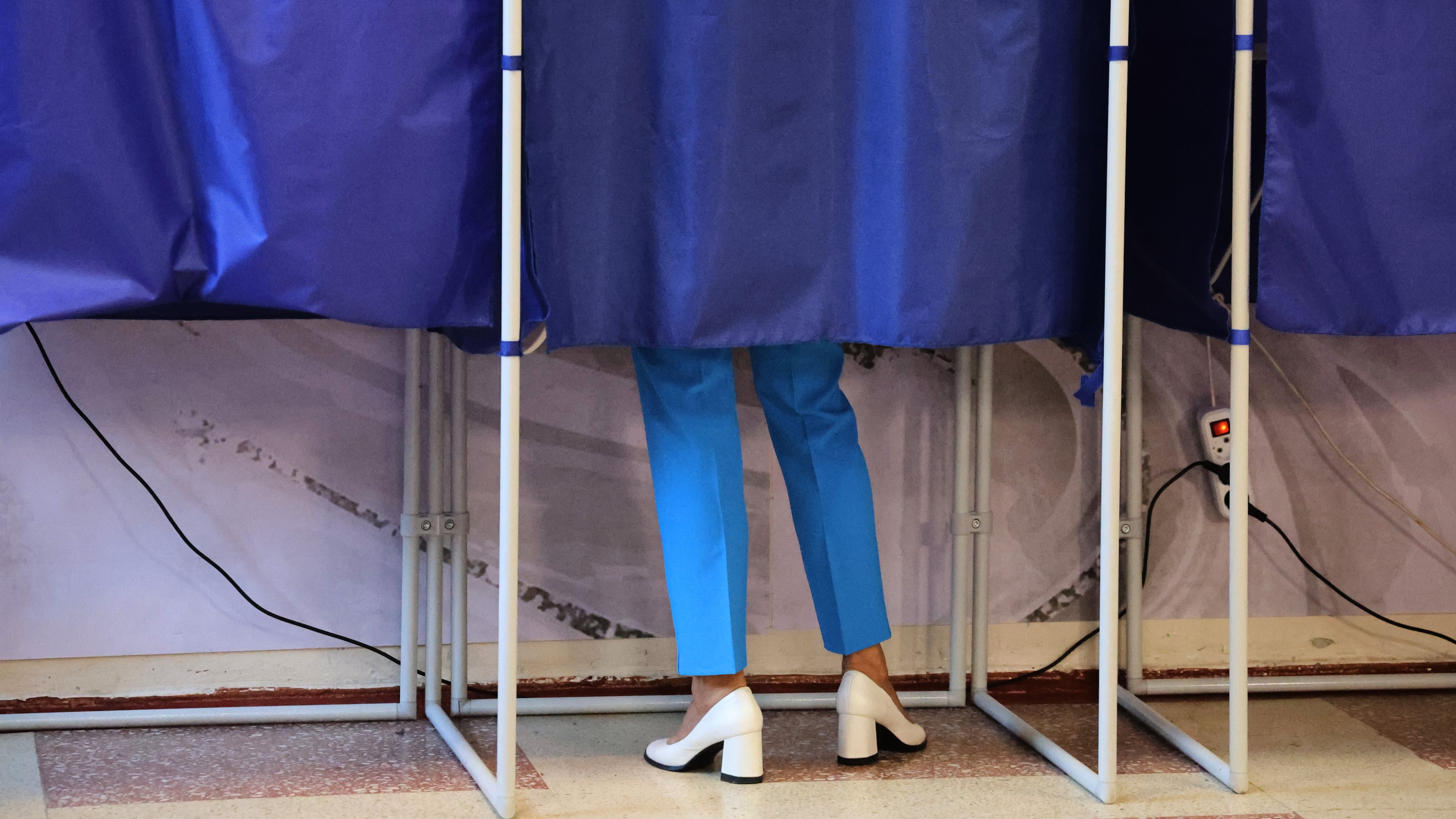 A voter fills-in a ballot during Russia's parliamentary election in Donetsk, in the Russian-controlled part of the Donetsk region, Ukraine, Friday, Sept. 18, 2026. (AP Photo)
