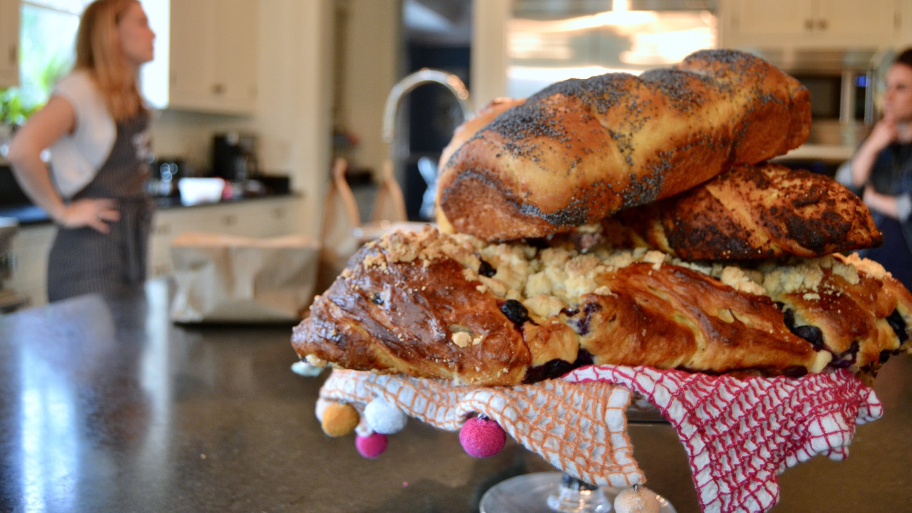 A tray of challah out for friends in Jaci Effron’s home kitchen. CONTRIBUTED BY BRAD KAPLAN