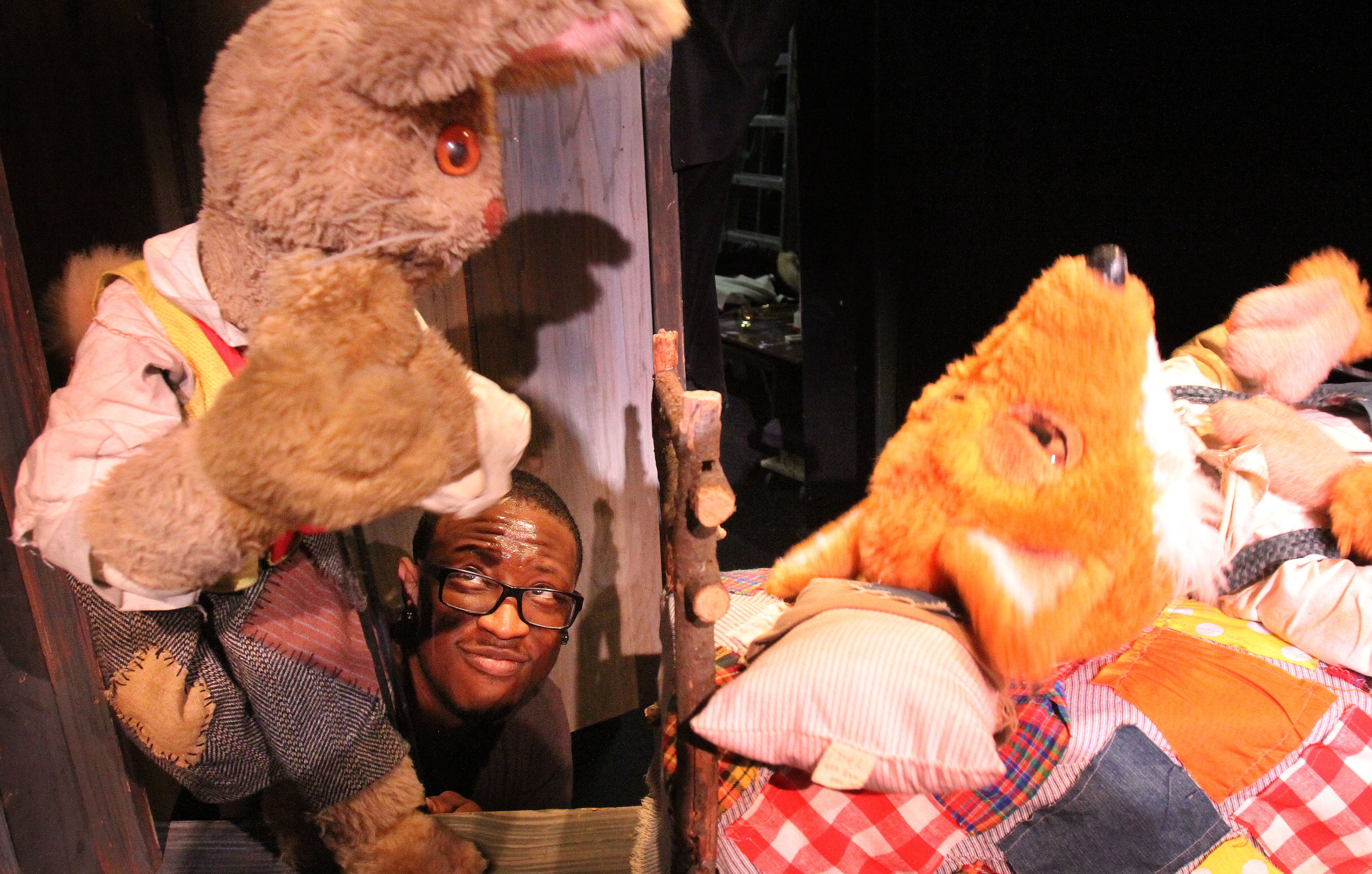 Jared Brodie (as Brer Rabbit, left) rehearses a scene with Dolph Amick (Brer Fox) for The Center for Puppetry Arts' production of "Brer Rabbit & Friends."