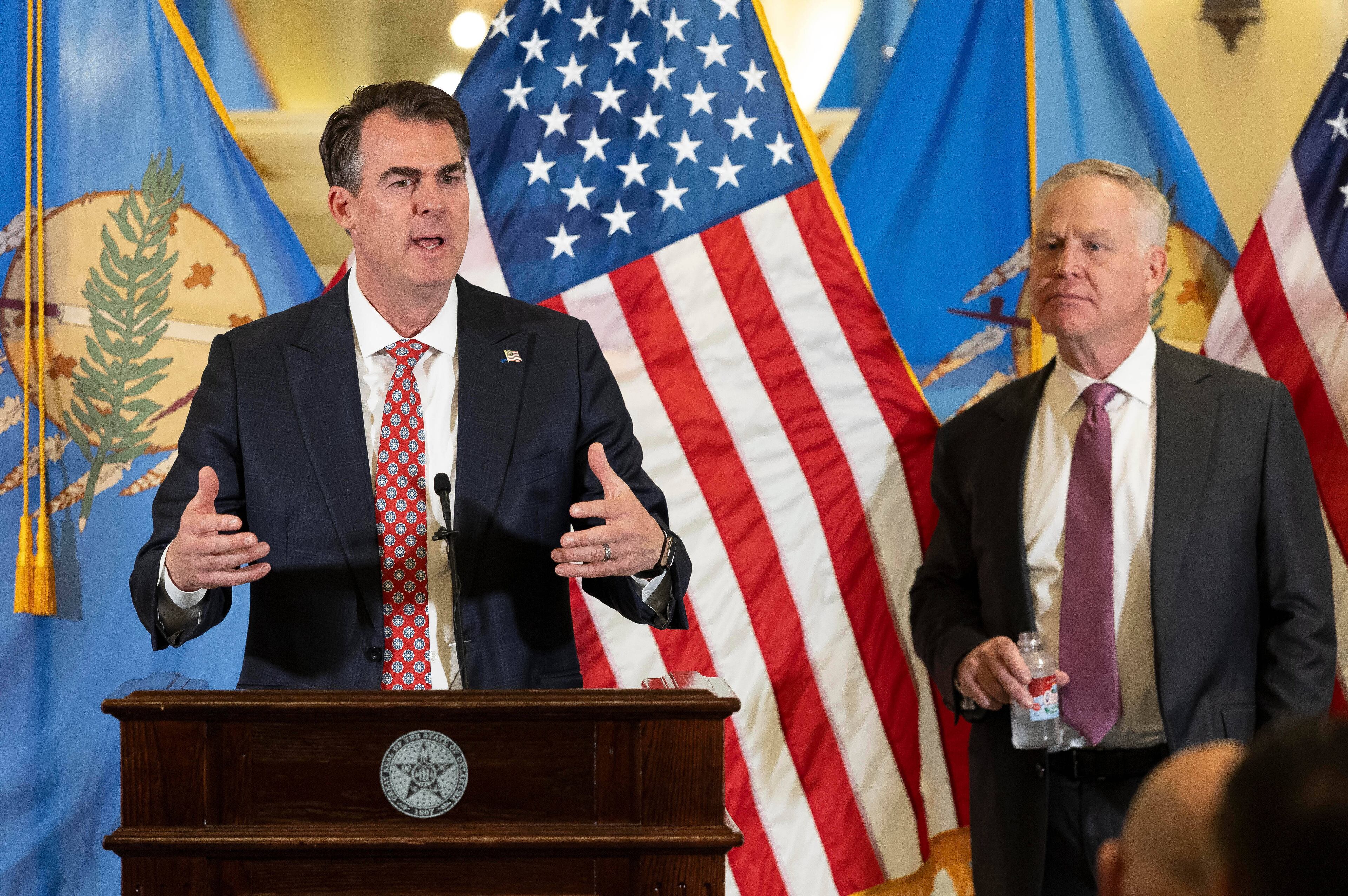 Kevin Stitt, Alan Armstrong