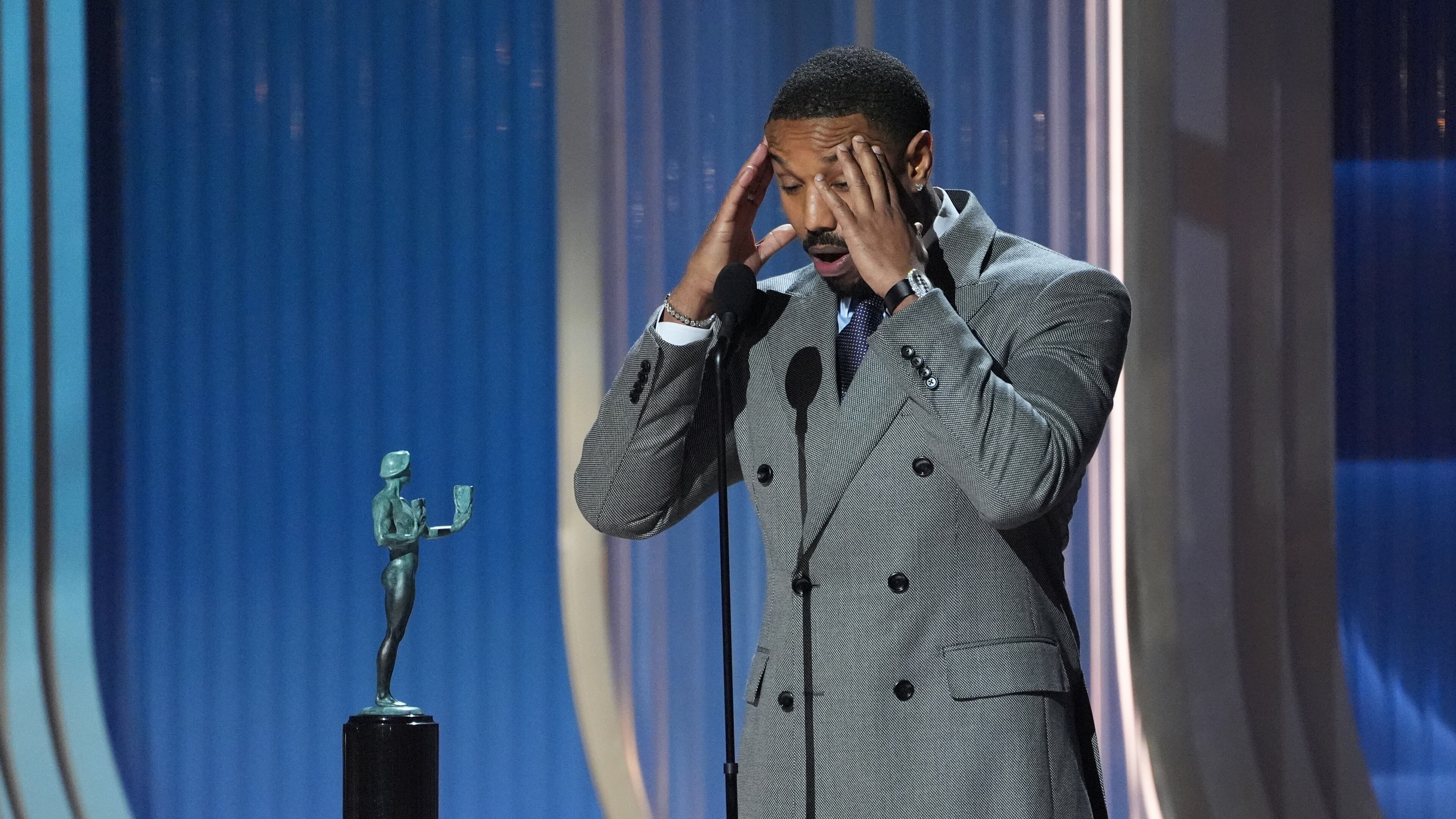 Michael B. Jordan accepts the award for outstanding performance by a male actor in a leading role for "Sinners" during the 32nd Annual Actor Awards on Sunday, March 1, 2026, at the Shrine Auditorium and Expo Hall in Los Angeles. (AP Photo/Chris Pizzello)