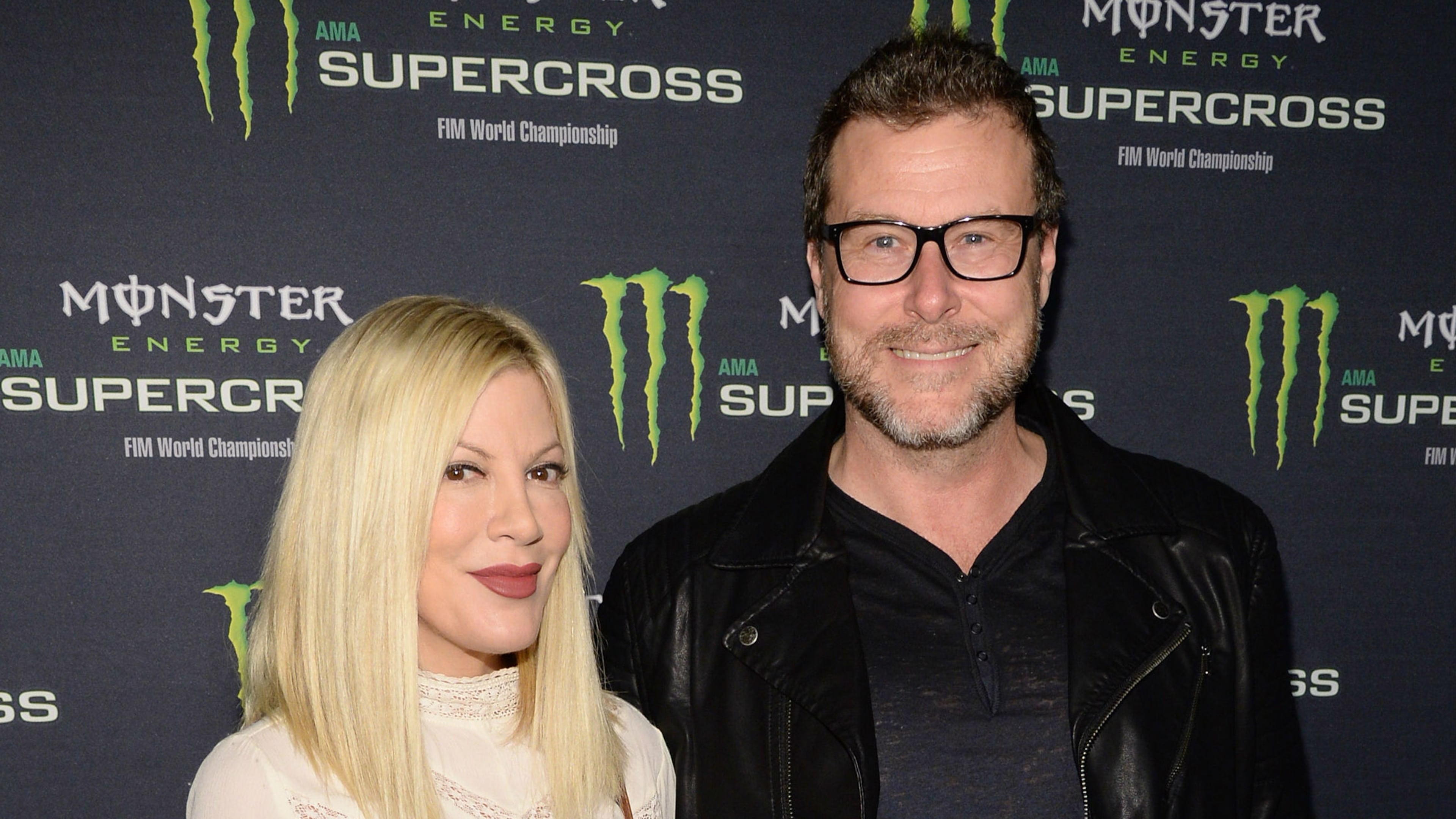 ANAHEIM, CA - JANUARY 23: Actors Tori Spelling (L) and Dean McDermott attend Monster Energy Supercross Celebrity Night at Angel Stadium of Anaheim on January 23, 2016 in Anaheim, California. (Photo by Michael Kovac/Getty Images for Feld Entertainment)