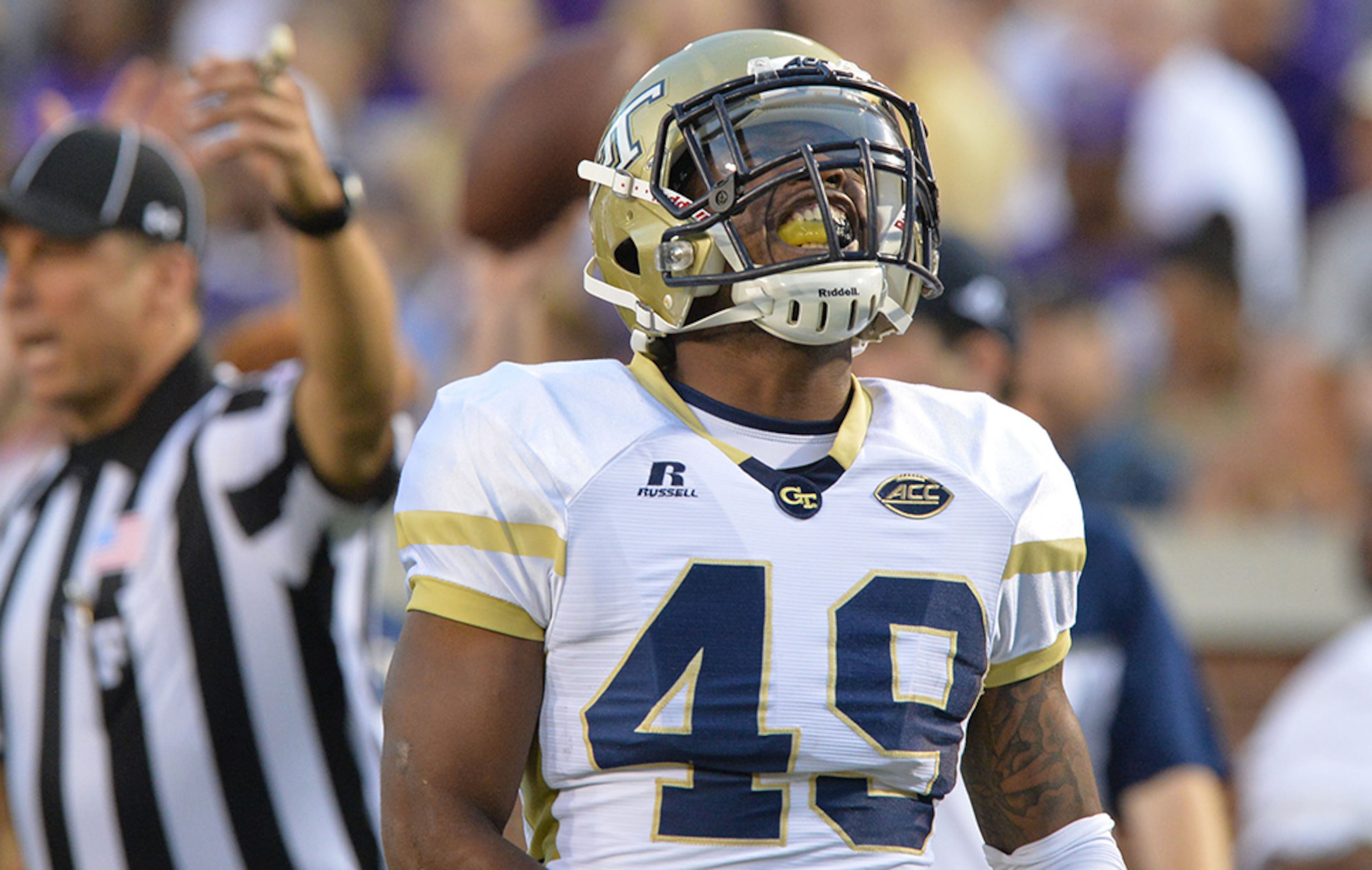 For 2015, Tech's jerseys featured a small change with two gold block stripes on the sleeves.