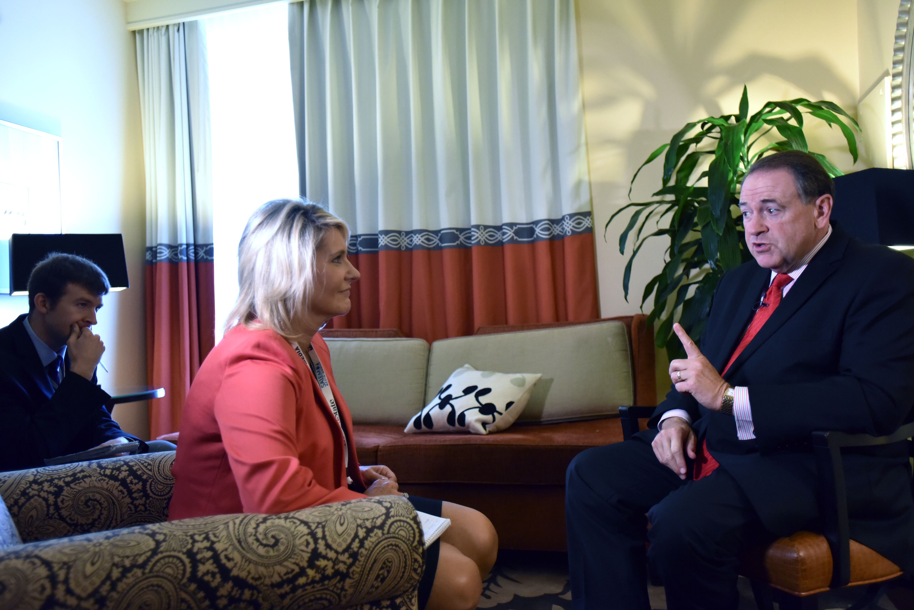 August 8, 2015 Atlanta - Former Arkansas Gov. Mike Huckabee speaks during an exclusive interview by WSB-TV reporter Lori Geary and AJC reporter Daniel Malloy (left) at Intercontinental Buckhead Hotel on Saturday, August 8, 2015. The organizer of the RedState Gathering has rescinded the Republican presidential candidate's invitation to speak at a Saturday evening rally at the College Football Hall of Fame. Erick Erickson said the billionaire's comments about Fox News anchor Megyn Kelly were "a bridge too far." Trump told CNN on Friday that "you could see there was blood coming out of her eyes. Blood coming out of her wherever" as she questioned him during Thursday's Republican presidential debate.HYOSUB SHIN / HSHIN@AJC.COM