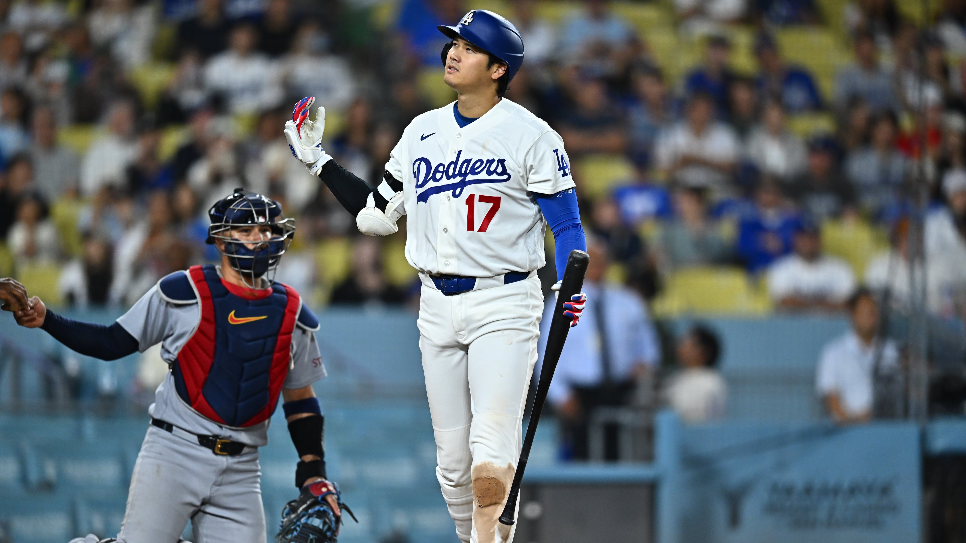 Los Angeles Dodgers' Shohei Ohtani (17) reacts after taking a strike during the 10th inning of a baseball game against the St. Louis Cardinals, Wednesday, Sept. 2, 2026, in Los Angeles. (AP Photo/William Liang)