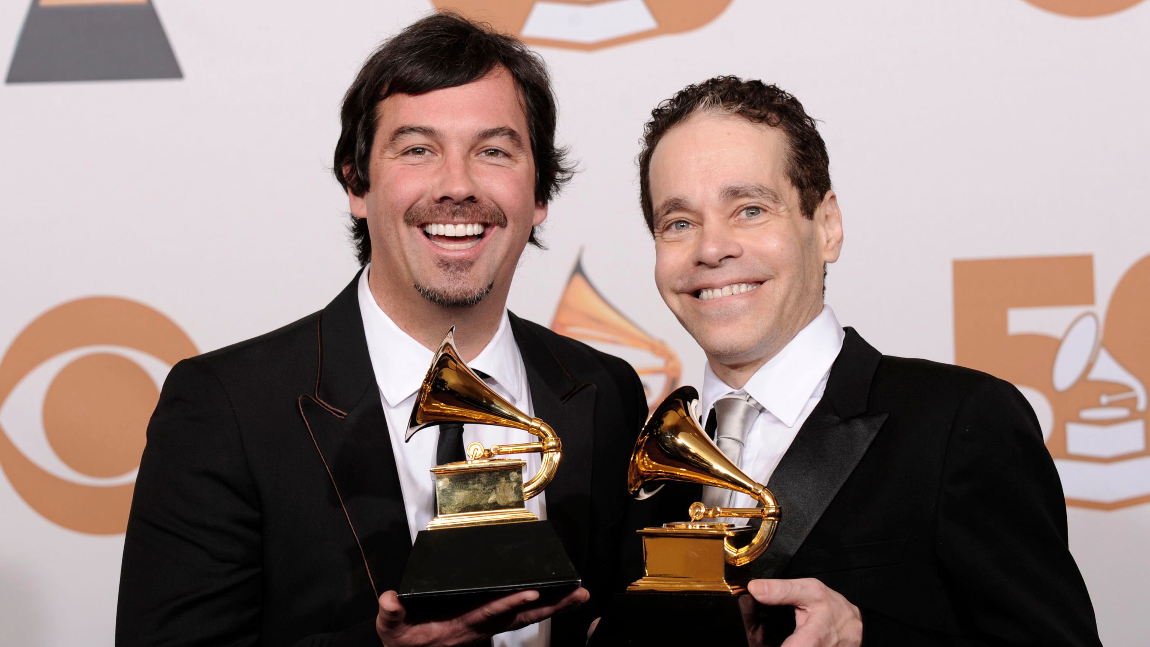 FIE - Duncan Sheik, left, and Steven Sater are seen with the award for best musical show album for "Spring Awakening" at the 50th Annual Grammy Awards on Sunday, Feb. 10, 2008, in Los Angeles. (AP Photo/Mark J. Terrill)