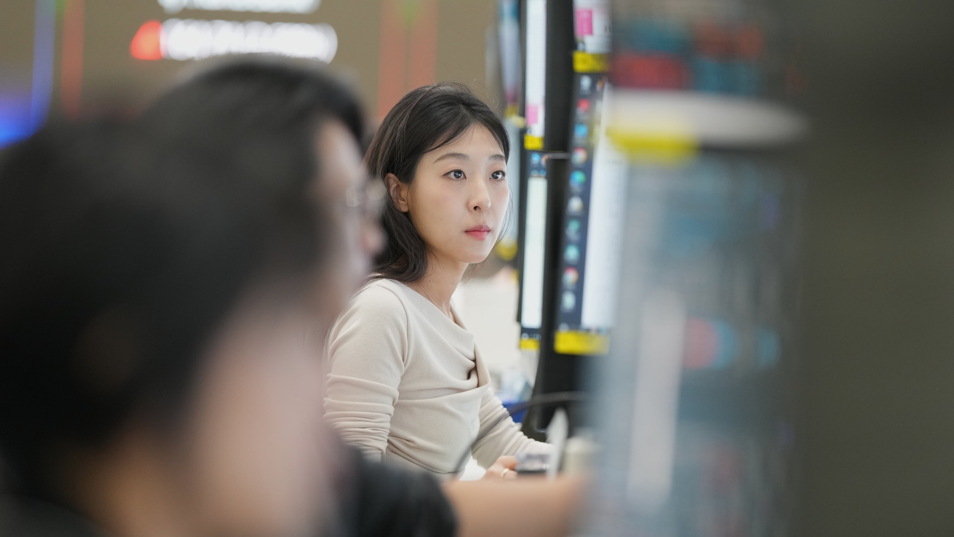 A dealer watches computer monitors at a dealing room of Hana Bank in Seoul, South Korea, Monday, May 4, 2026. (AP Photo/Lee Jin-man)