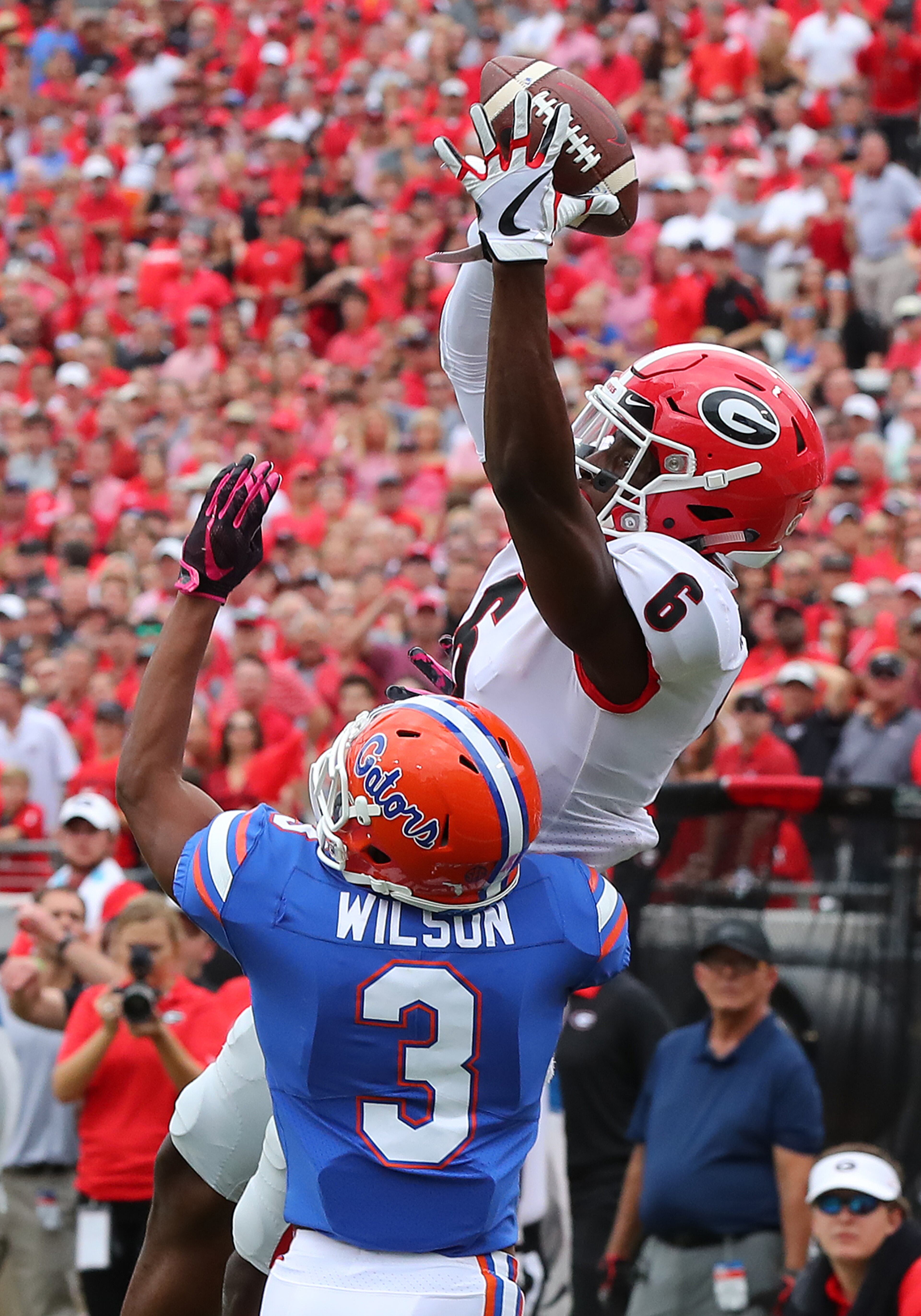 October 28, 2017 Jacksonville: Georgia wide receiver Javon Wims catches a touchdown pass over Florida defender Marco Wilson to take a 14-0 lead over Florida during the first quarter in a NCAA college football game on Friday, October 27, 2017, in Jacksonville. Curtis Compton/ccompton@ajc.com