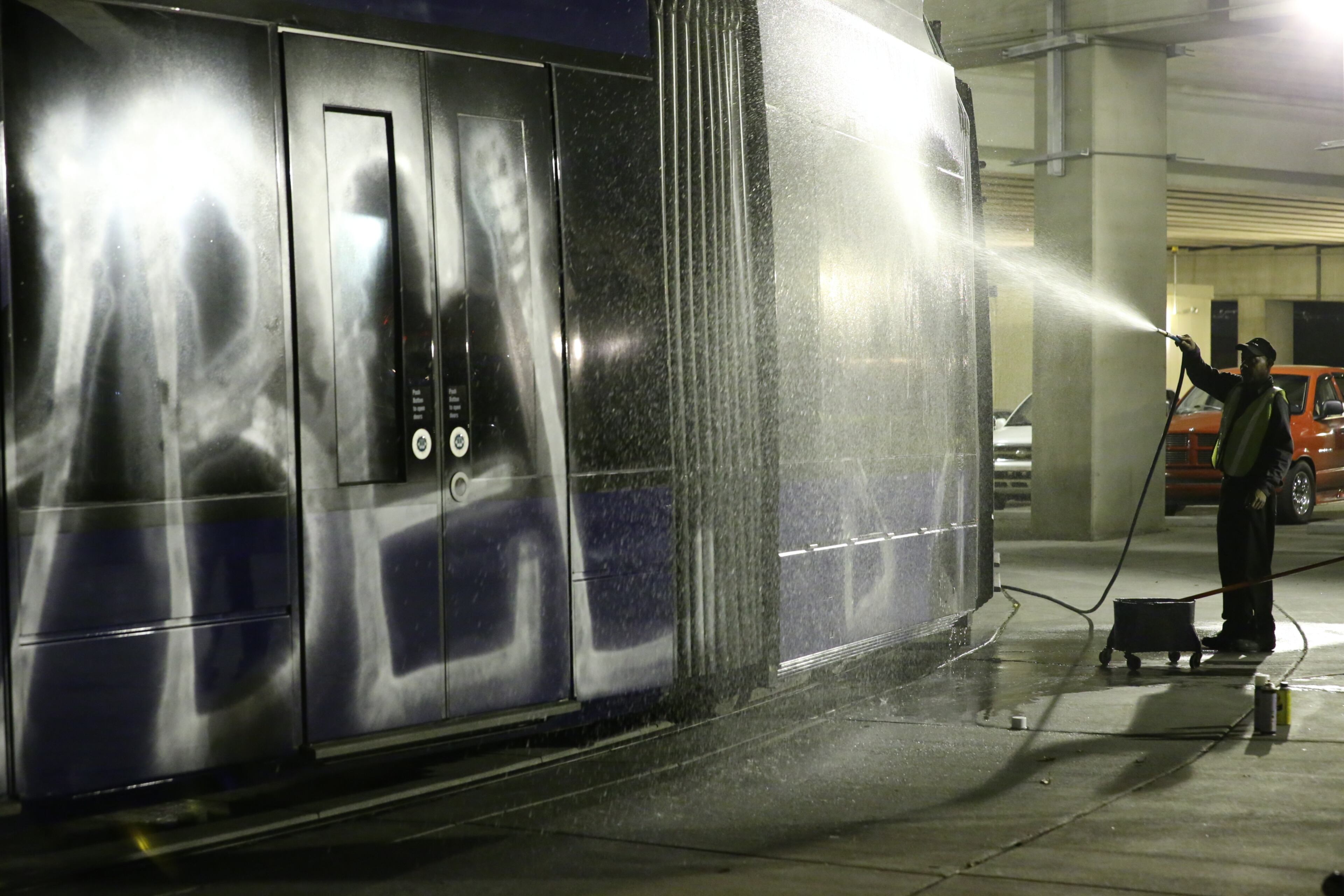 Cleanup begins on Atlanta streetcars vandalized on Sept. 22, 2015. Police Tuesday were working to determine who vandalized several Atlanta streetcars overnight.The streetcars were spray painted with large graffiti while parked for the night at the streetcar maintenance barn under the Downtown Connector near Auburn and Edgewood avenues.The vandalism was reported to authorities about 3:30 a.m. Tuesday, according to Atlanta police dispatchers.
