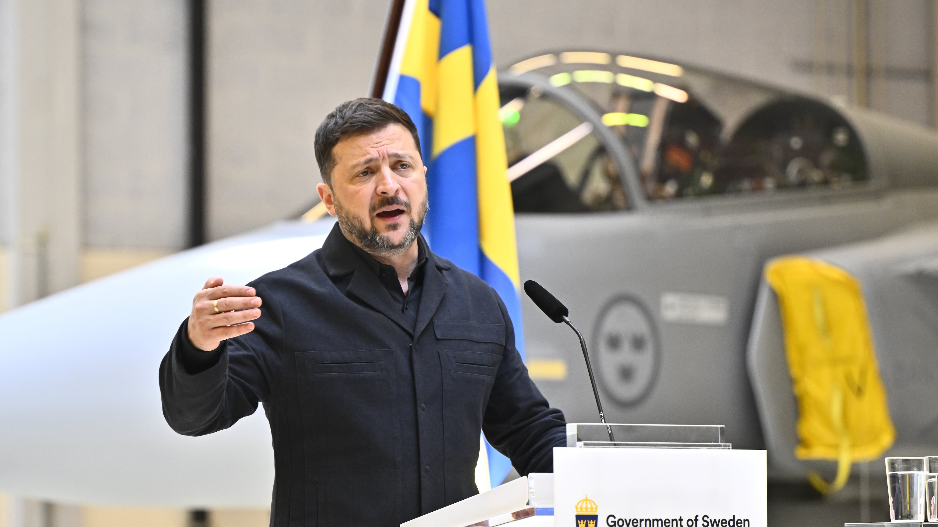 Ukraine's President Volodymyr Zelenskyy and Sweden's Prime Minister Ulf Kristersson, not seen, give a joint news conference at the F16 air flotilla in Uppsala, Sweden, Thursday, May 28, 2026. (Christine Olsson/TT News Agency via AP)