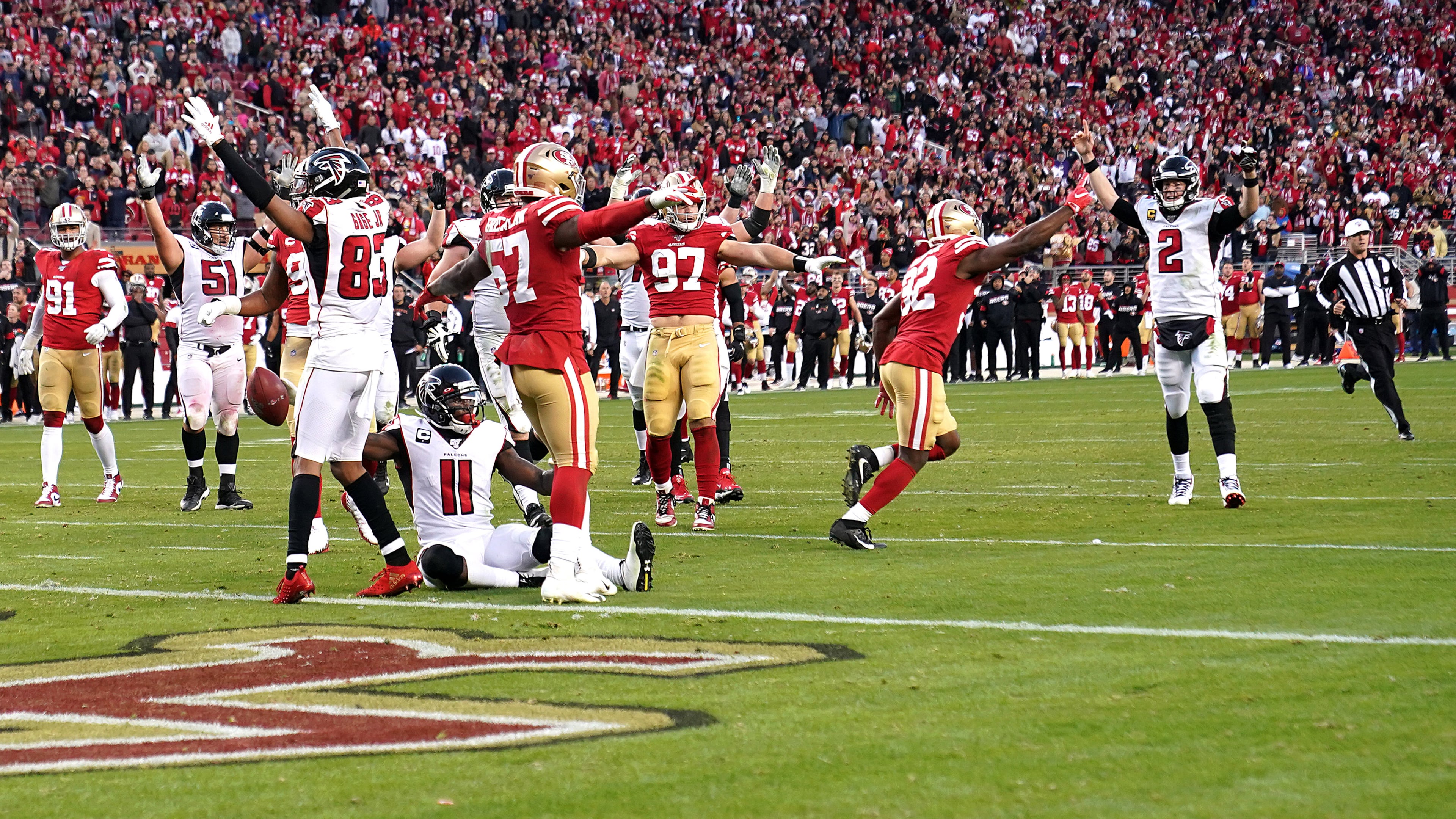 Falcons wide receiver Julio Jones (11) and team celebrate the game-winning touchdown over the San Francisco 49ers Sunday, Dec. 15, 2019, at Levi's Stadium in Santa Clara, Calif.