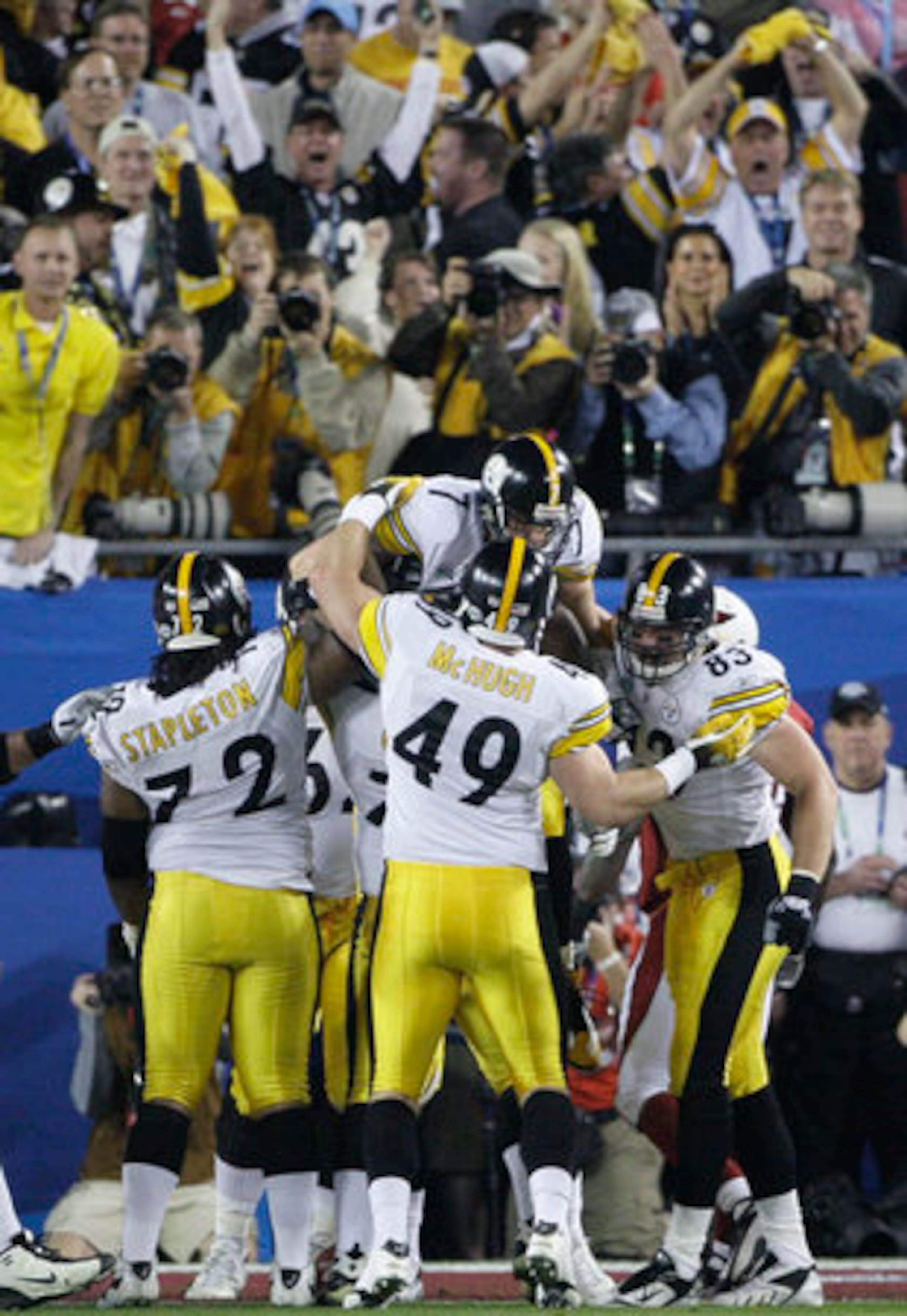 Steelers quarterback Ben Roethlisberger (7) celebrates with teammates after what was initially ruled a 1-yard touchdown run. After a replay, Roethlisberger was ruled down short of the goal line. The Steelers kicked a field goal to take a 3-0 lead.