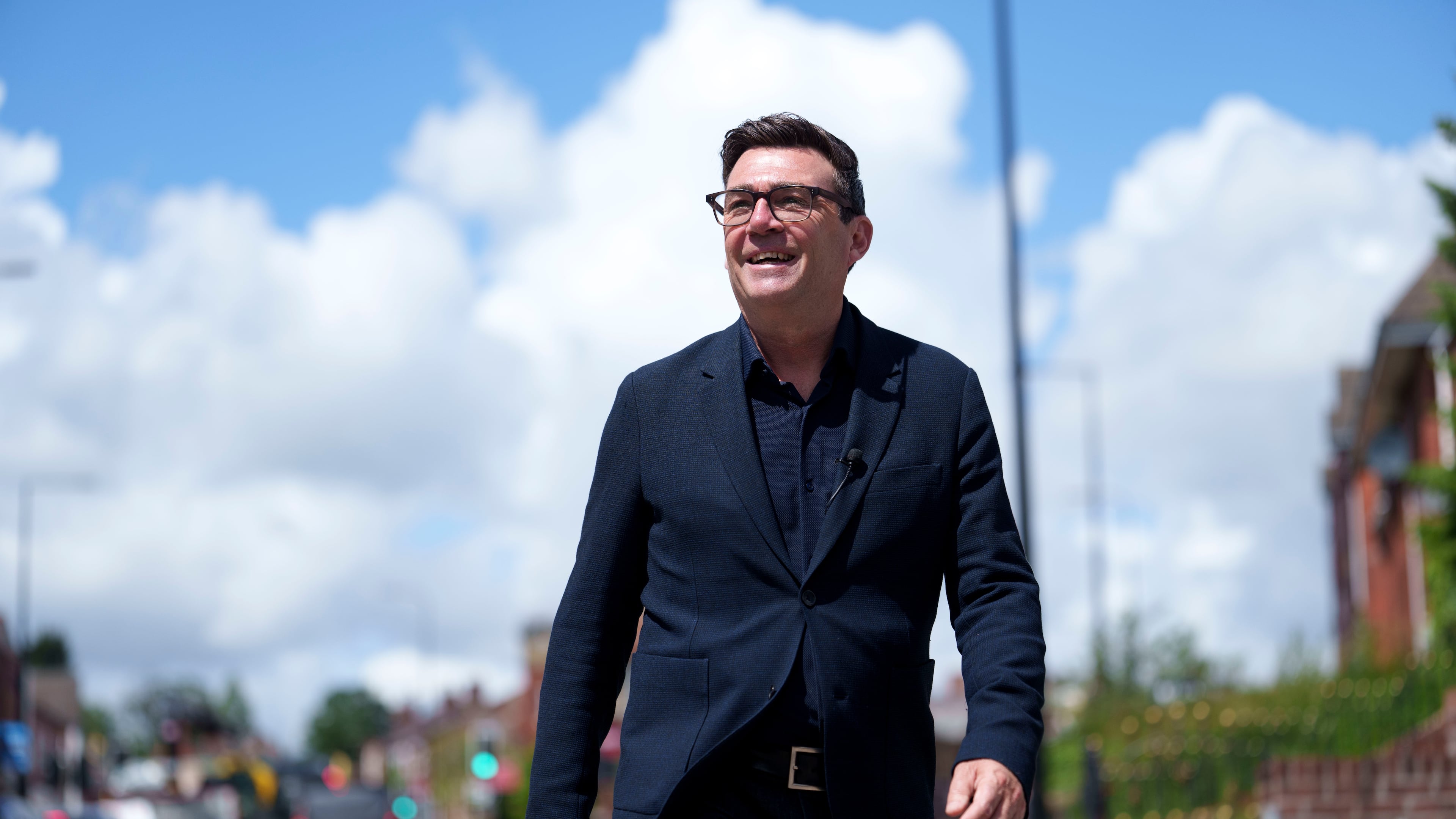 Andy Burnham smiles during a campaign visit to Ashton-in-Makerfield before the forthcoming by-election, in Manchester, England, Tuesday, June 9, 2026. CORRECTION: corrects family name to Burnham instead of Bunham (AP Photo/Jon Super)