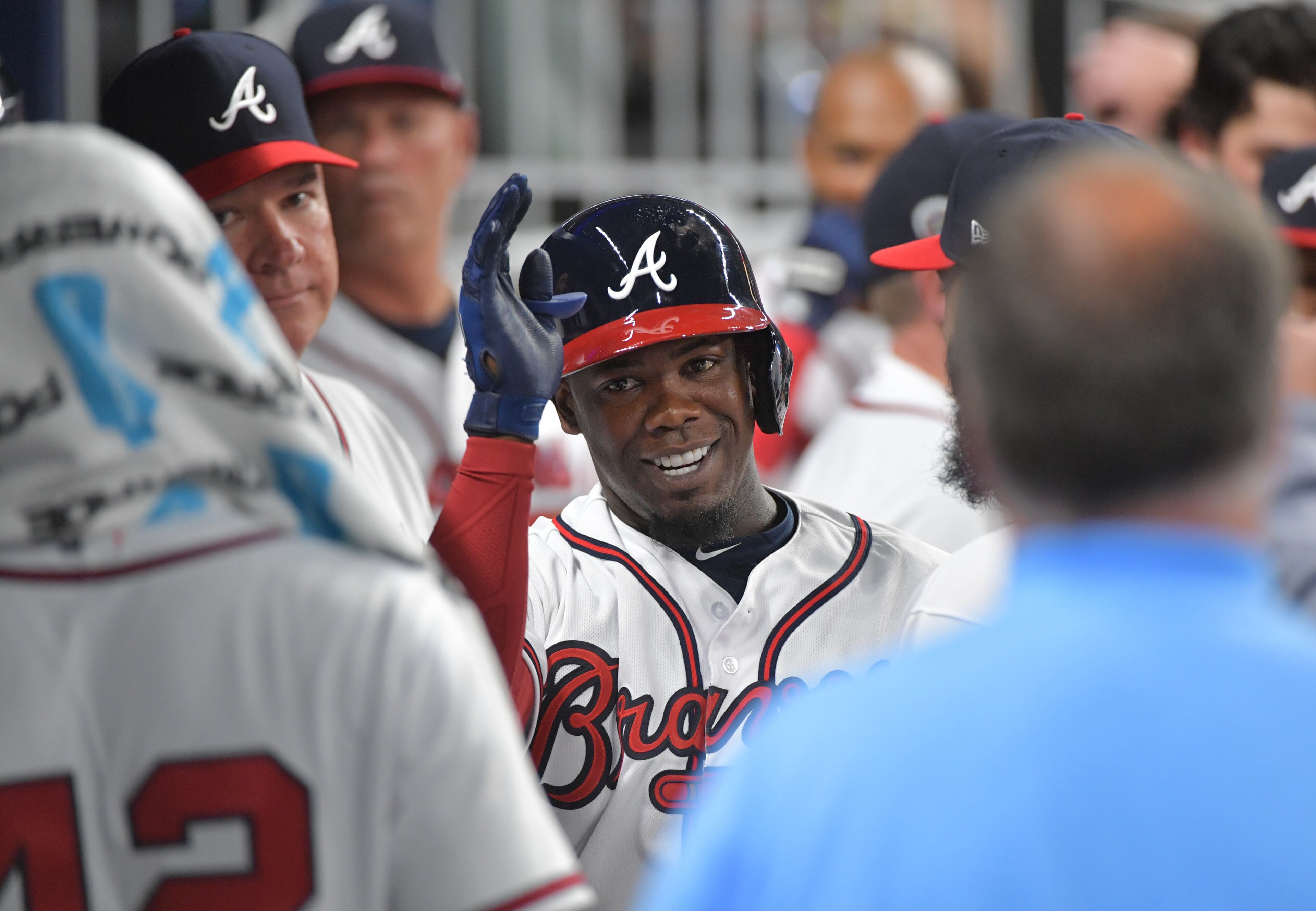 Adonis Garcia is congratulated by teammates after his home run in the sixth.