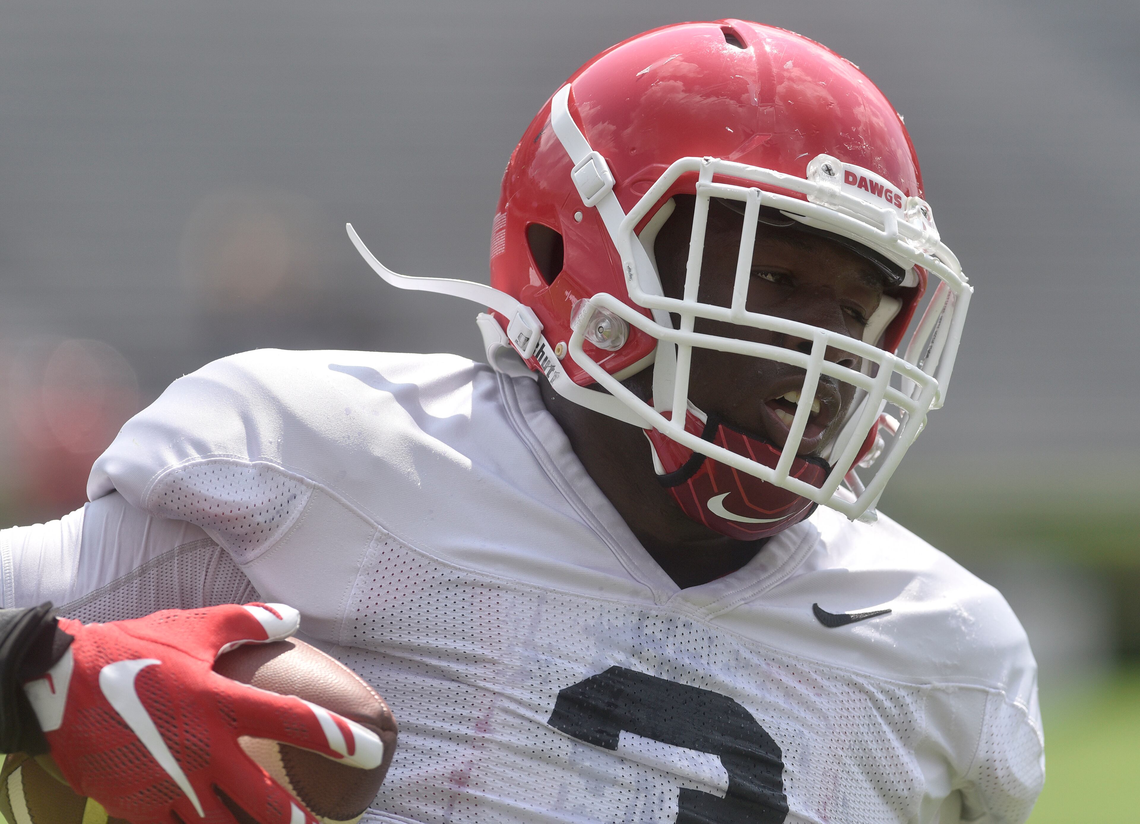 Georgia wide receiver Tyler Simmons (3) runs after catching a pass in an open practice during the annual UGA Fan Day at Sanford Stadium on Saturday, Aug 5, 2017 in Athens, Ga.
(RICHARD HAMM)