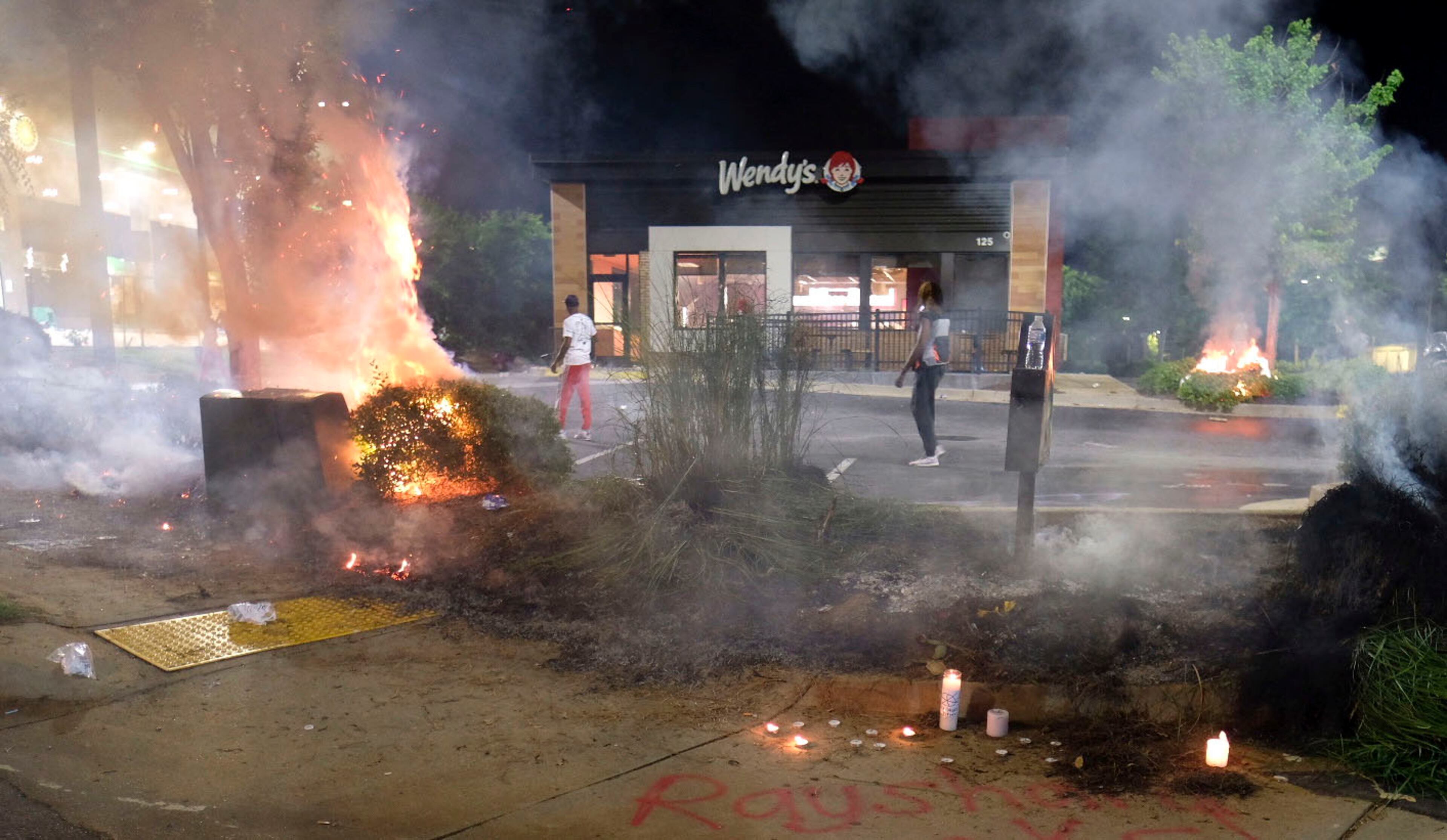 The Wendy's on University Avenue in Atlanta is in flames after demonstrators blocked the interstate and set it on fire Saturday night, June 13, 2020. Protesters gathered there after Rayshard Brooks, a 27-year-old black man, was shot and killed by Atlanta police Friday evening during a struggle at the Wendy's drive-thru line. (Photo: Ben Gray for The Atlanta Journal-Constitution)
