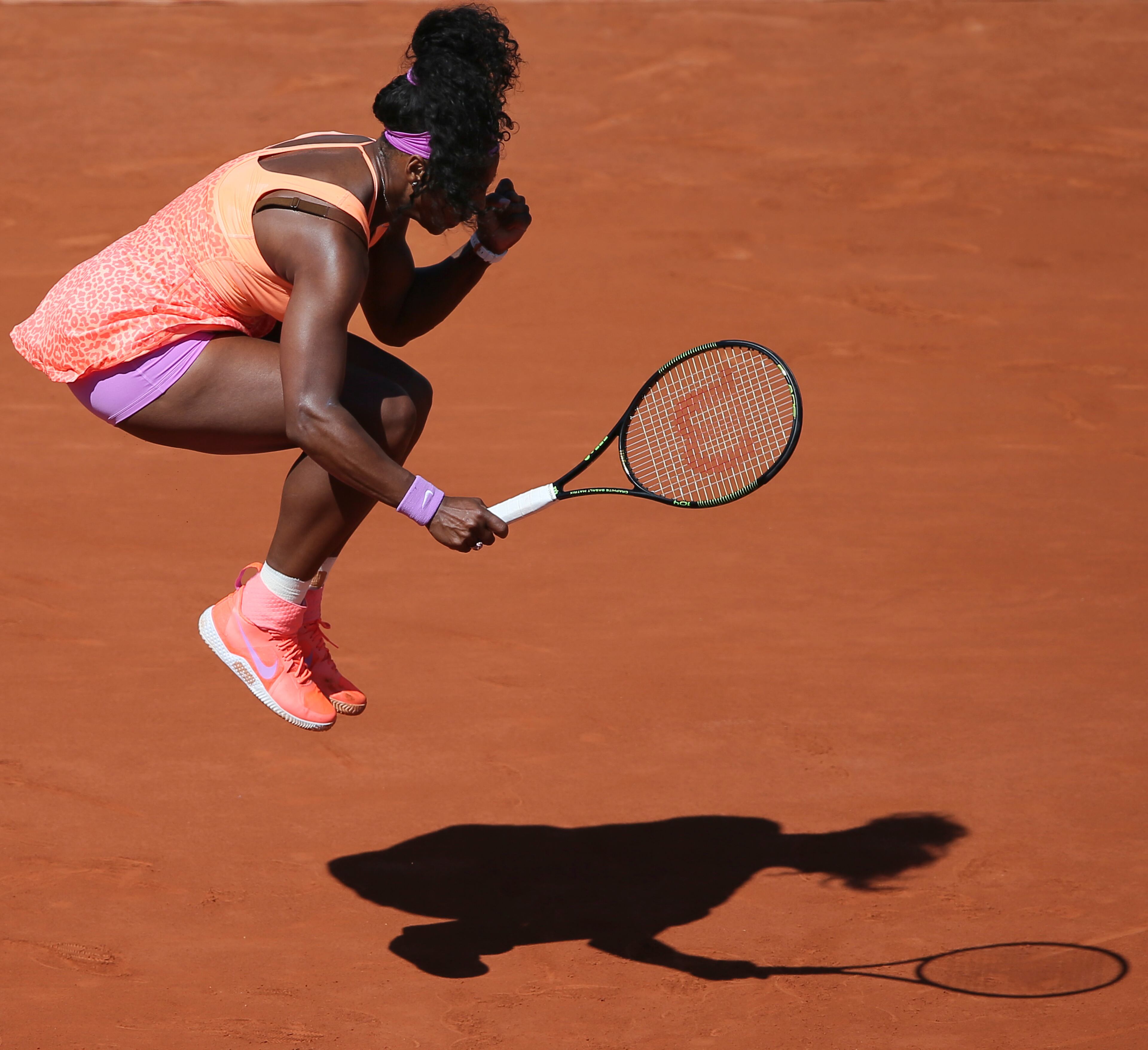 Serena Williams of the U.S. celebrates scoring a point in the final of the French Open tennis tournament against Lucie Safarova of the Czech Republic, which Williams won in three sets 6-3, 6-7, 6-2, at the Roland Garros stadium, in Paris, France, Saturday, June 6, 2015. (AP Photo/David Vincent)