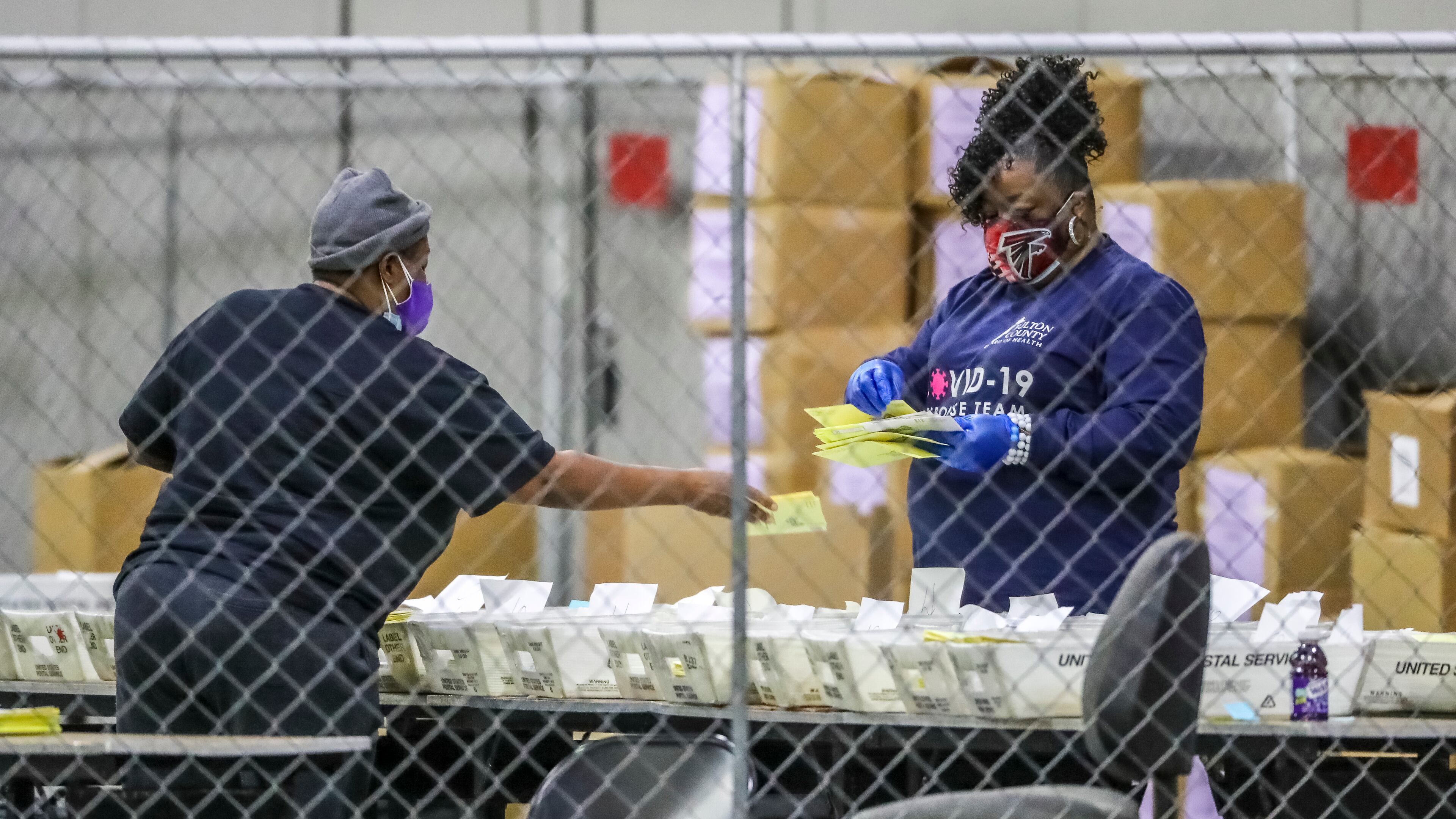 January 6, 2021 Atlanta: Fulton County election workers resumed counting ballots at 9:30 a.m. on Wednesday, Jan. 6, 2021 an hour later than election officials had planned. Fulton elections director Richard Barron told county commissioners Wednesday morning there are 7,500 absentee ballots left to be uploaded. Fulton spokeswoman Jessica Corbitt said there are 2,700 left to be processed at Georgia World Congress Center. Mail-in ballots take more time to count because they are more complicated to tabulate. There are a variety of reasons, including an adjudication process that allows ballots with stray markings or other irregularities to be reviewed by poll watchers from each party. The adjudication process for those remaining ballots will begin today at 3 p.m. That means Fulton’s ballots won’t be uploaded until after 3 p.m., Barron said. The process will occur at the county’s English Street warehouse, which is where votes are actually uploaded once they’ve been adjudicated. “We have been unfairly, and I’ll state that unequivocally, unfairly criticized by any number of people,” Fulton Commission Chairman Robb Pitts said during a virtual press conference, “no justification whatsoever.” State election officials said voting generally went smoothly Tuesday, with short lines and average wait times of about 1 minute. (John Spink / John.Spink@ajc.com)