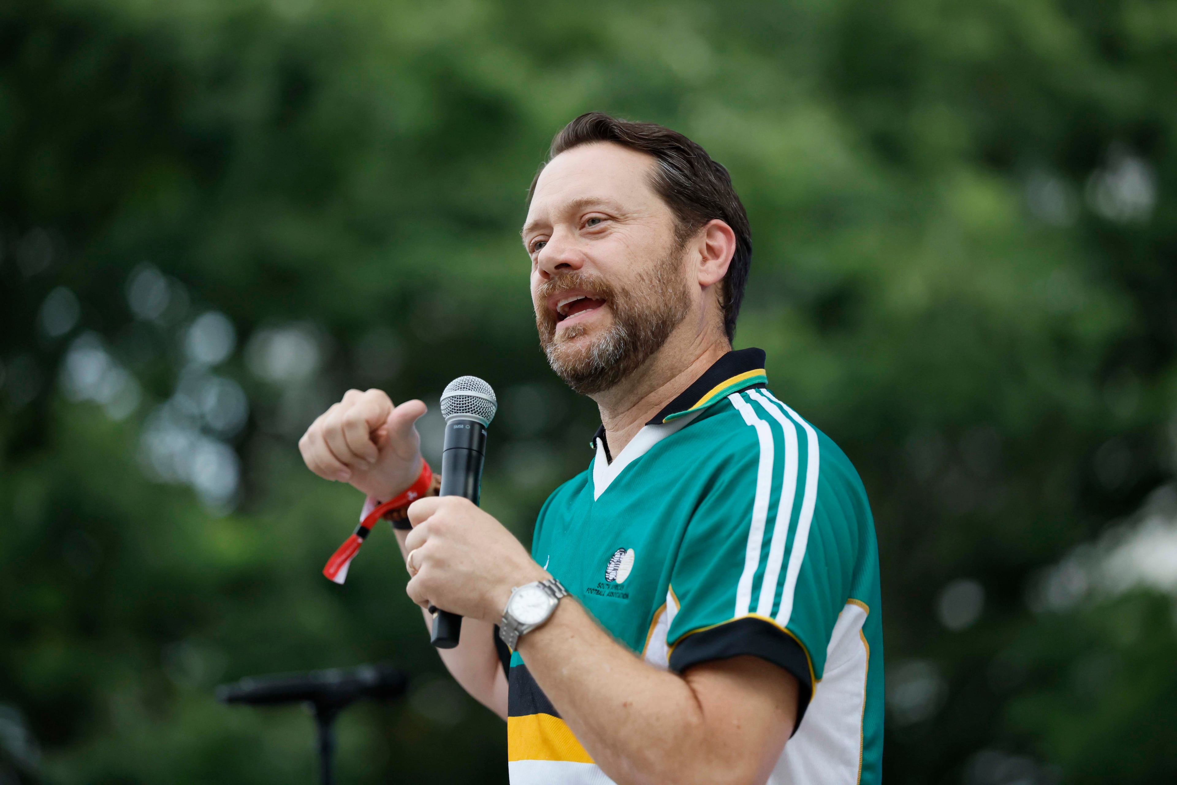 Jason Carter, grandson of the late President Jimmy Carter, introduces the War and Treaty at Decatur WatchFest ’26 on Thursday, June 25, 2026. (Miguel Martinez/AJC)