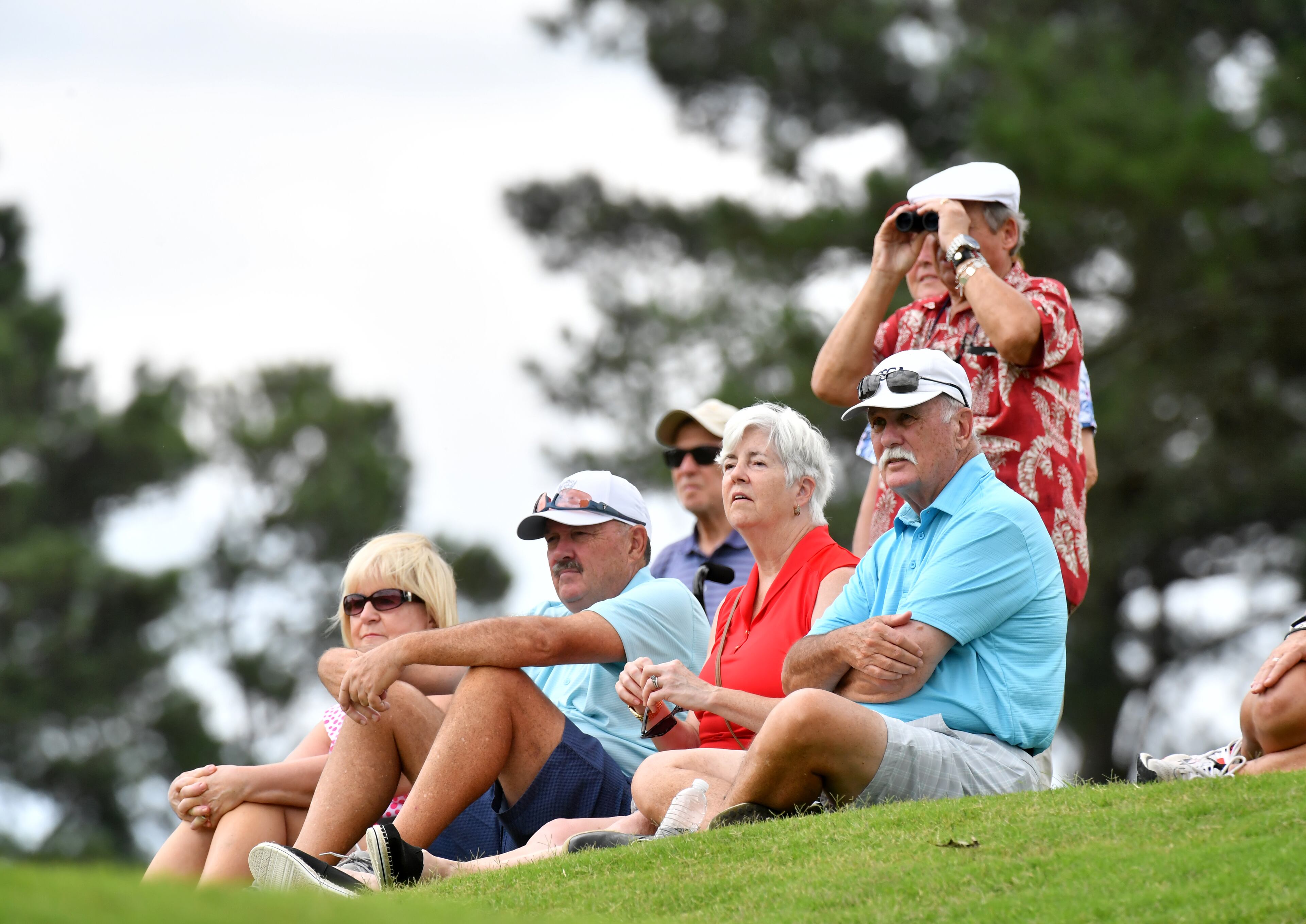 Spectators watch at the Atlanta Athletic Club in Johns Creek on Thursday, June 24, 2021. (Hyosub Shin / Hyosub.Shin@ajc.com)
